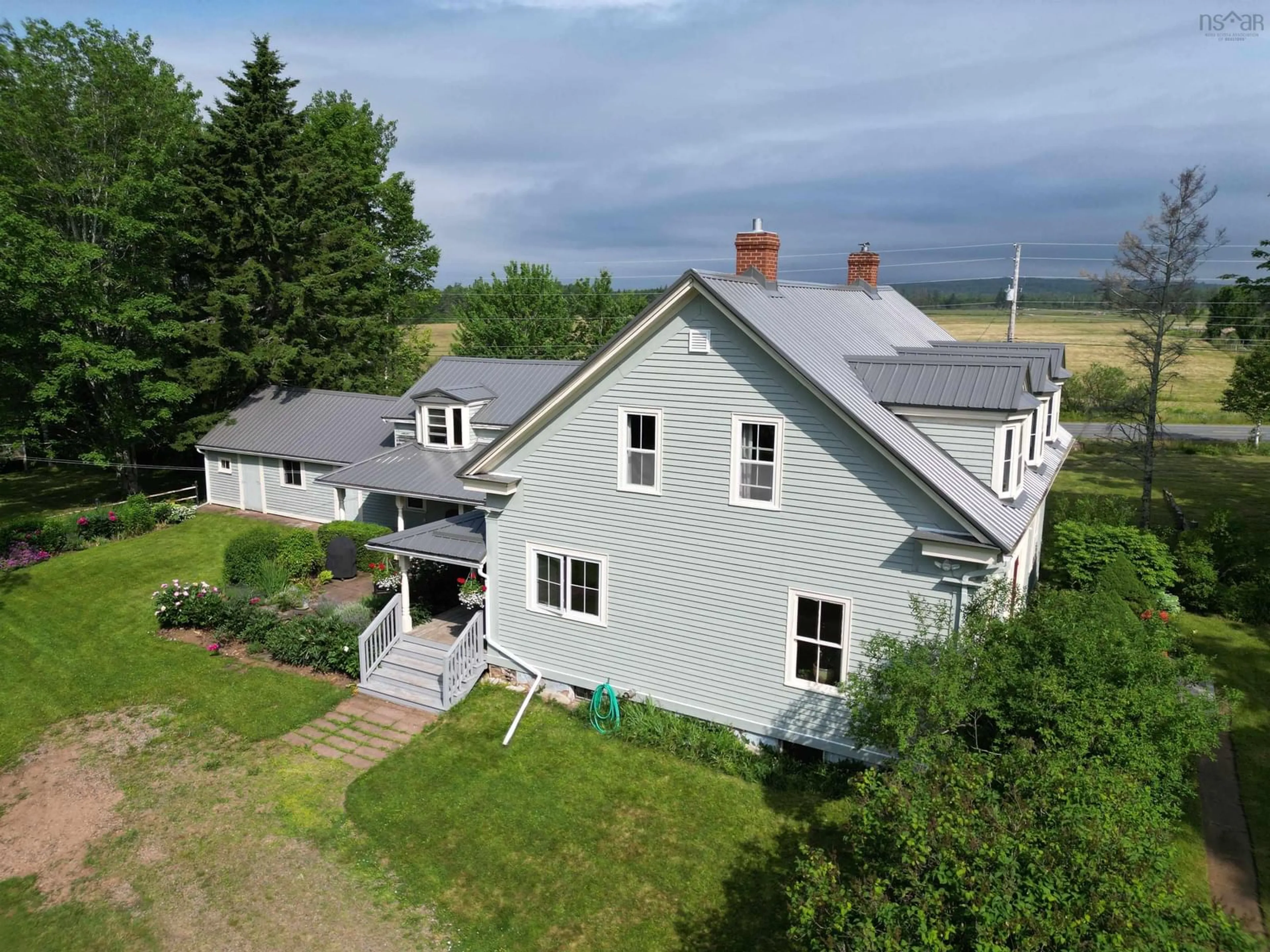 A pic from outside/outdoor area/front of a property/back of a property/a pic from drone, water/lake/river/ocean view for 8480 Highway 2, Great Village Nova Scotia B0M 1L0