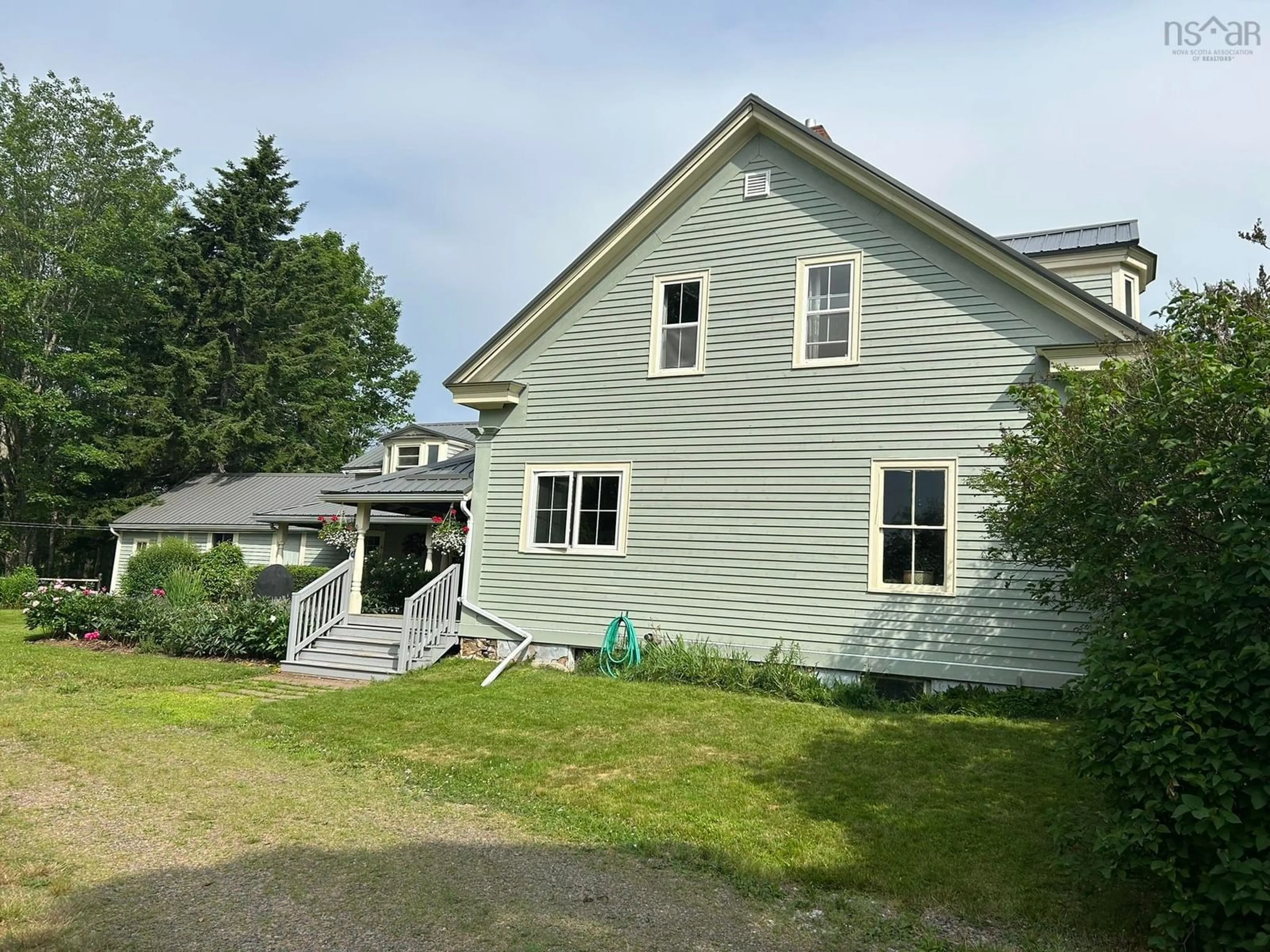 A pic from outside/outdoor area/front of a property/back of a property/a pic from drone, building for 8480 Highway 2, Great Village Nova Scotia B0M 1L0