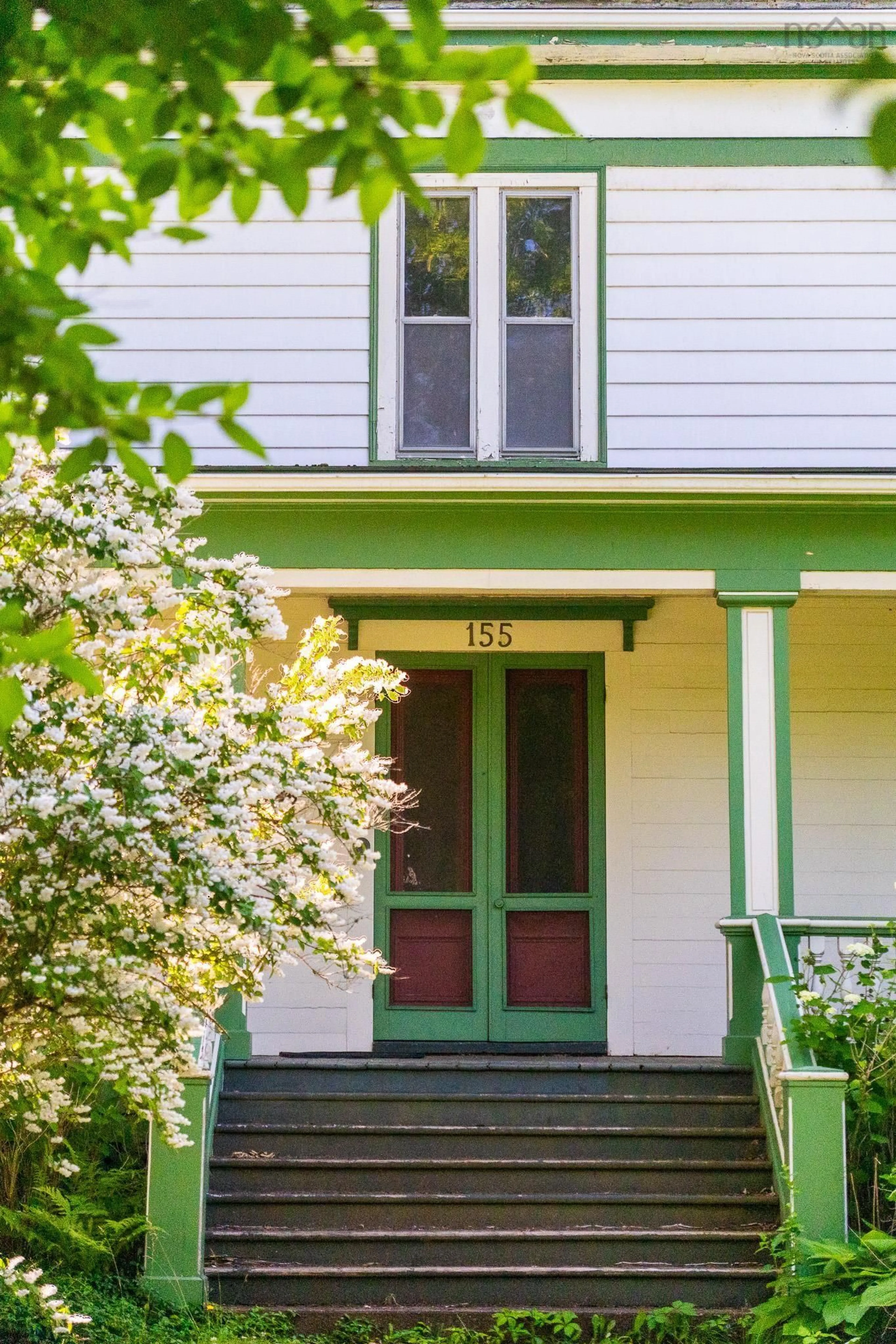 Home with vinyl exterior material, street for 155 Main St, Wolfville Nova Scotia B4P 1C9