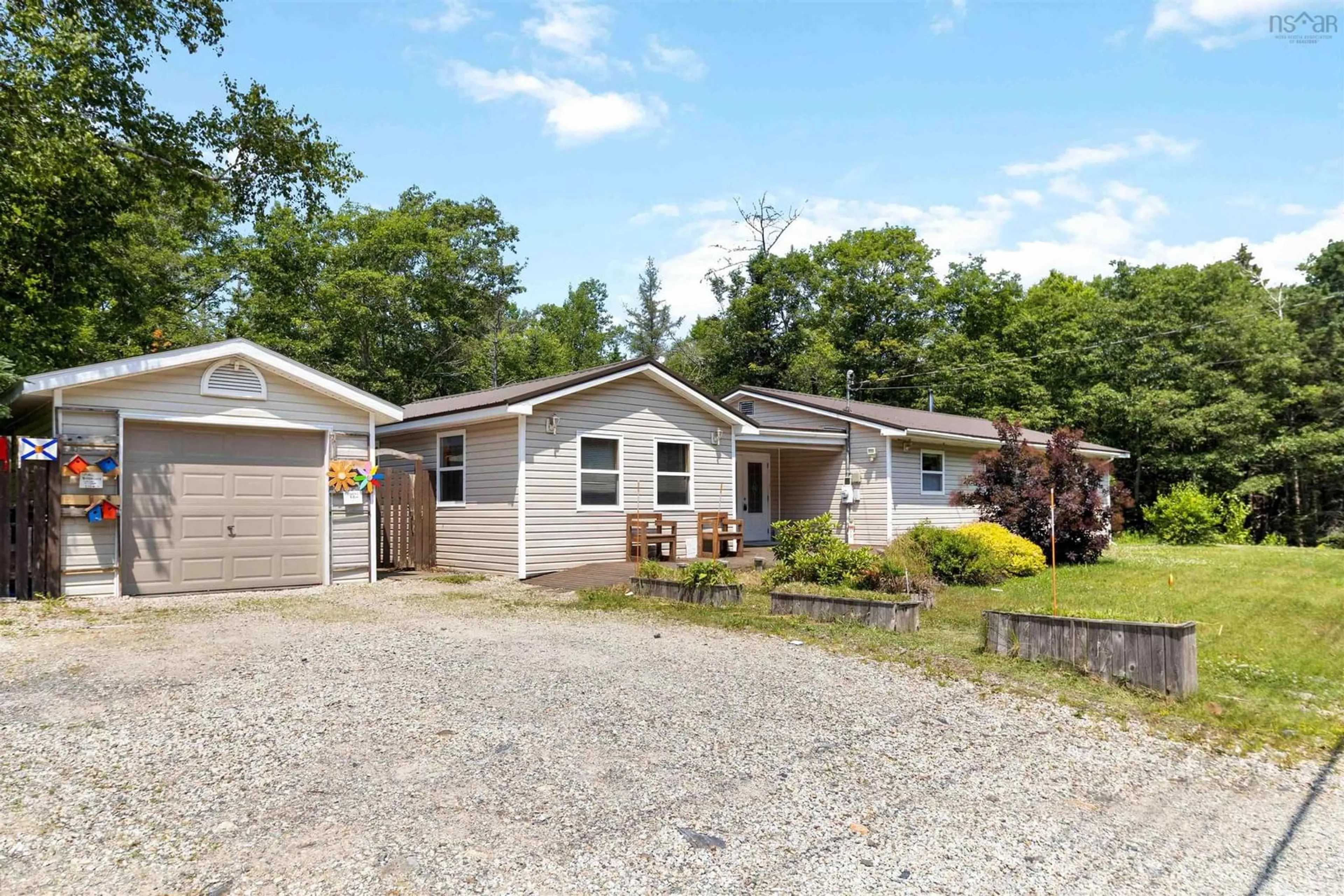 Home with vinyl exterior material, street for 6736 Highway 3, Martins Point Nova Scotia B0J 2E0