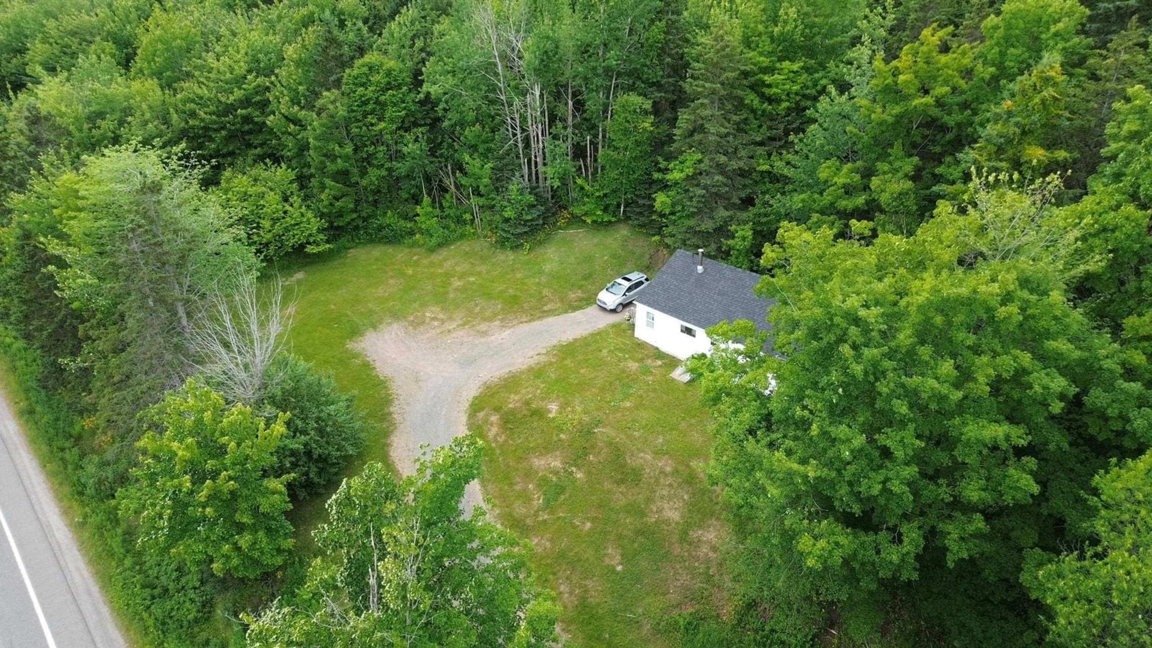 A pic from outside/outdoor area/front of a property/back of a property/a pic from drone, forest/trees view for 11301 Highway 105, Aberdeen Nova Scotia B0E 3M0