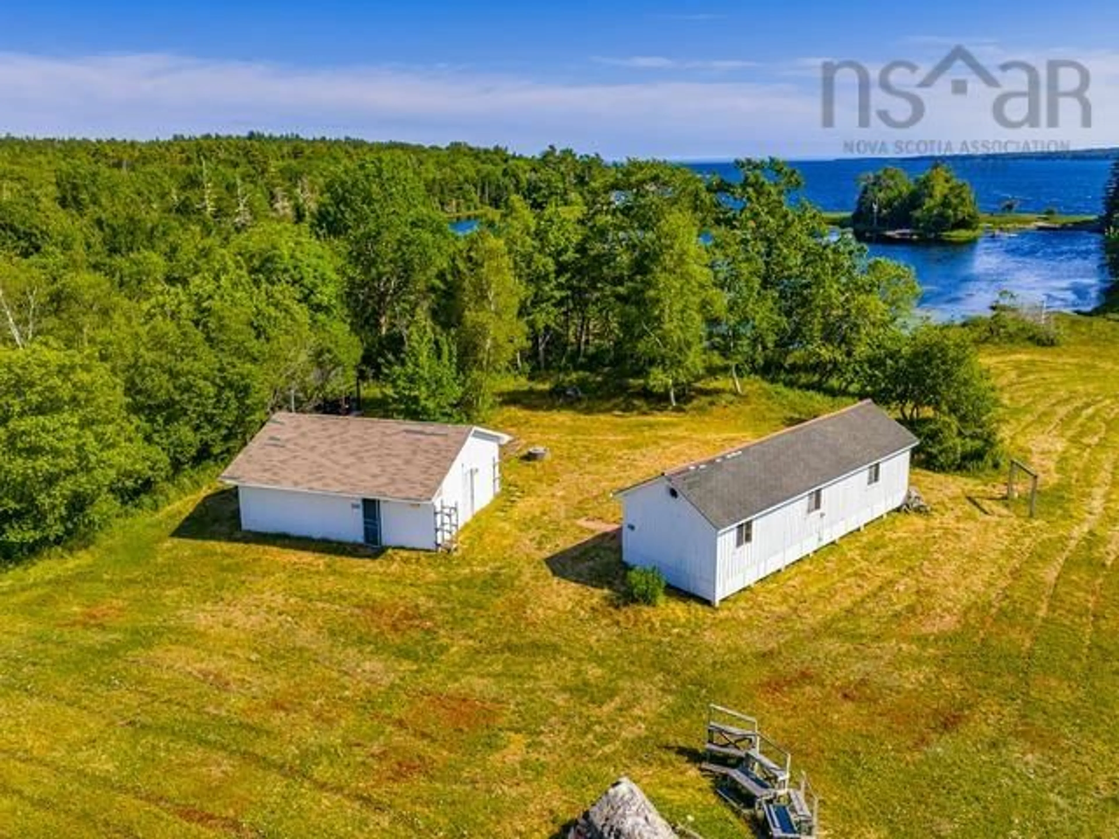 A pic from outside/outdoor area/front of a property/back of a property/a pic from drone, water/lake/river/ocean view for 6019 Highway 3, Jordan Falls Nova Scotia B0T 1W0