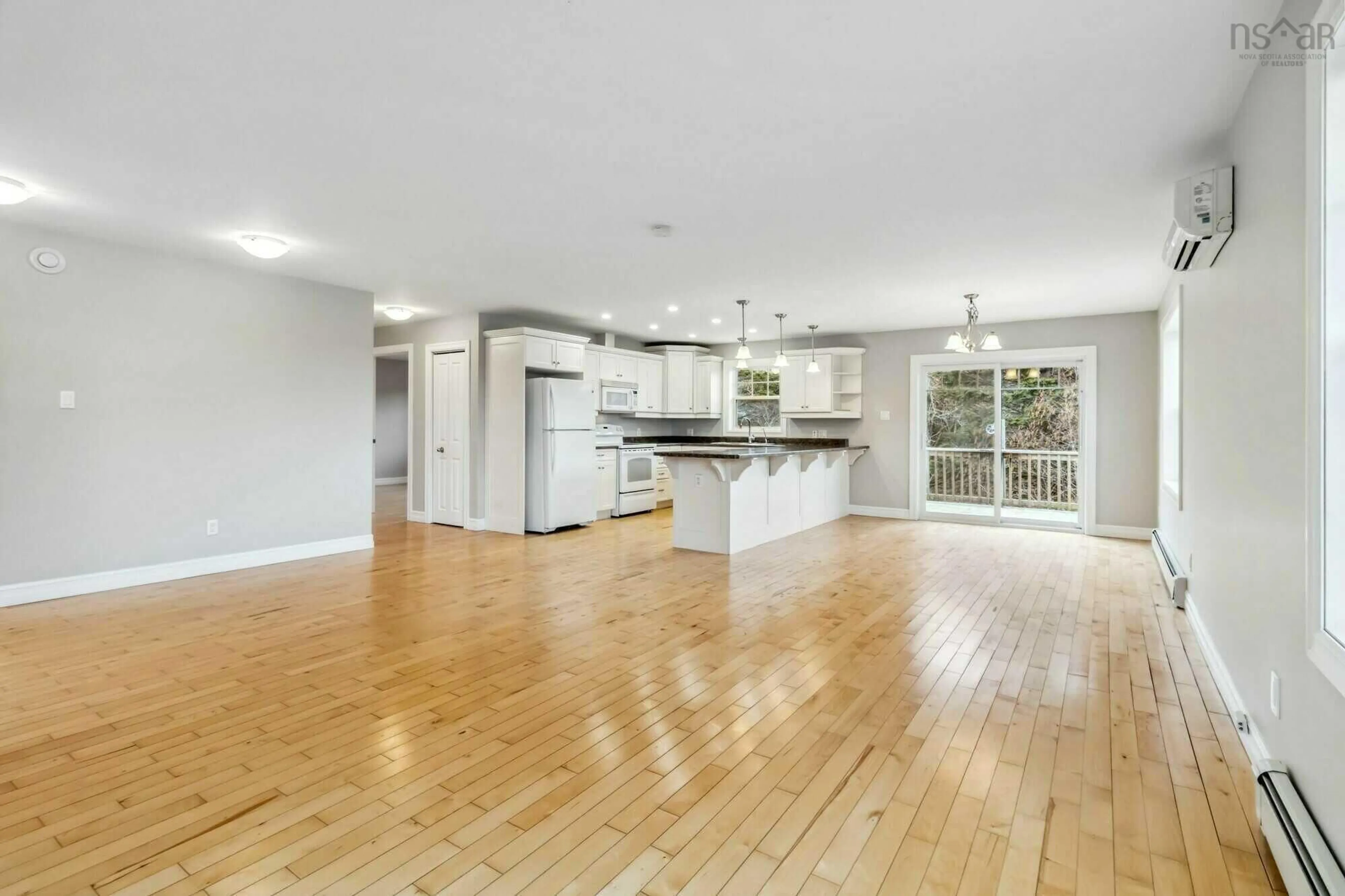 Open concept kitchen, wood/laminate floor for 22 Hatchett Lane, Hatchet Lake Nova Scotia B3T 1S1