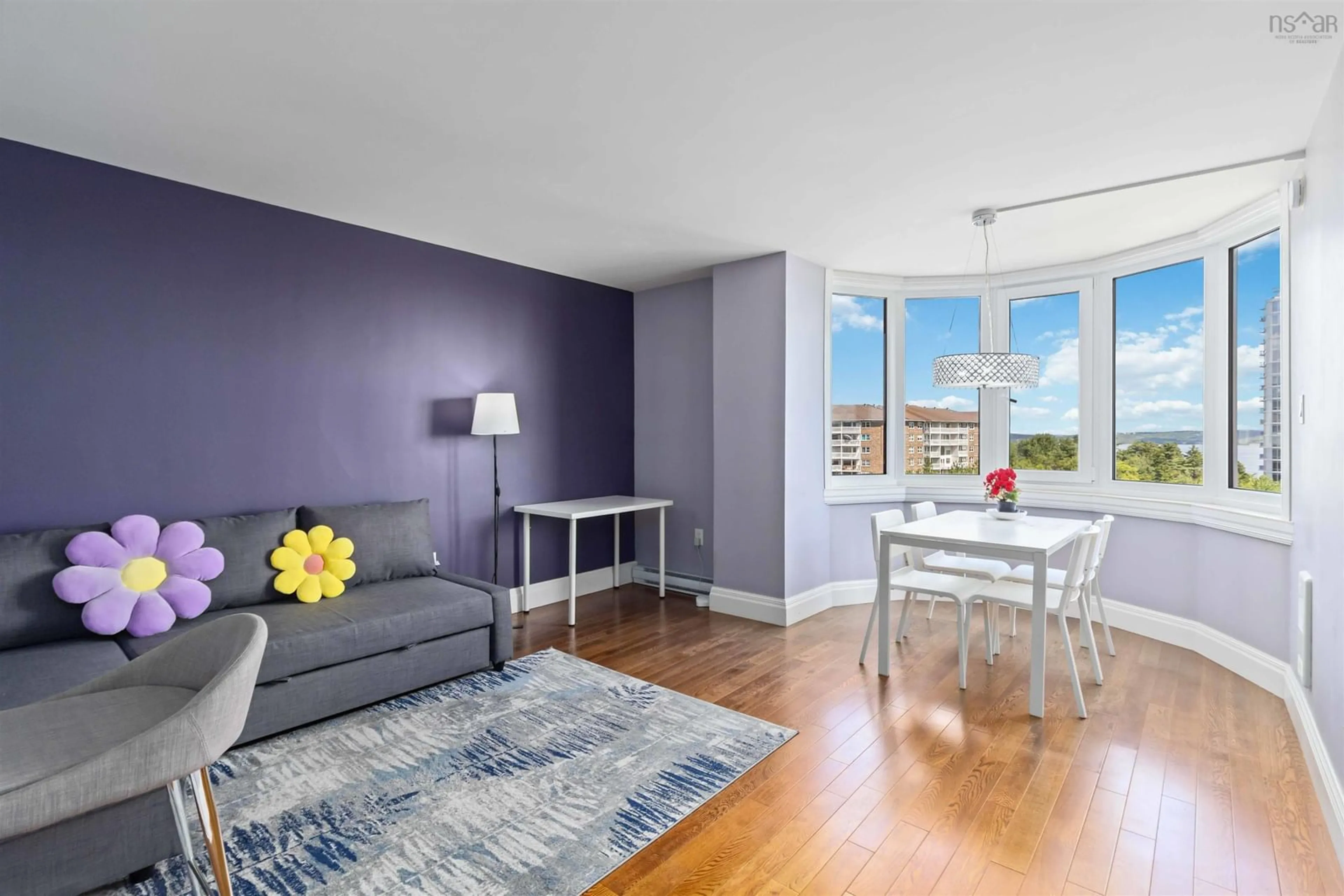 Living room with furniture, wood/laminate floor for 45 Vimy Ave #718, Halifax Nova Scotia B3M 4C5