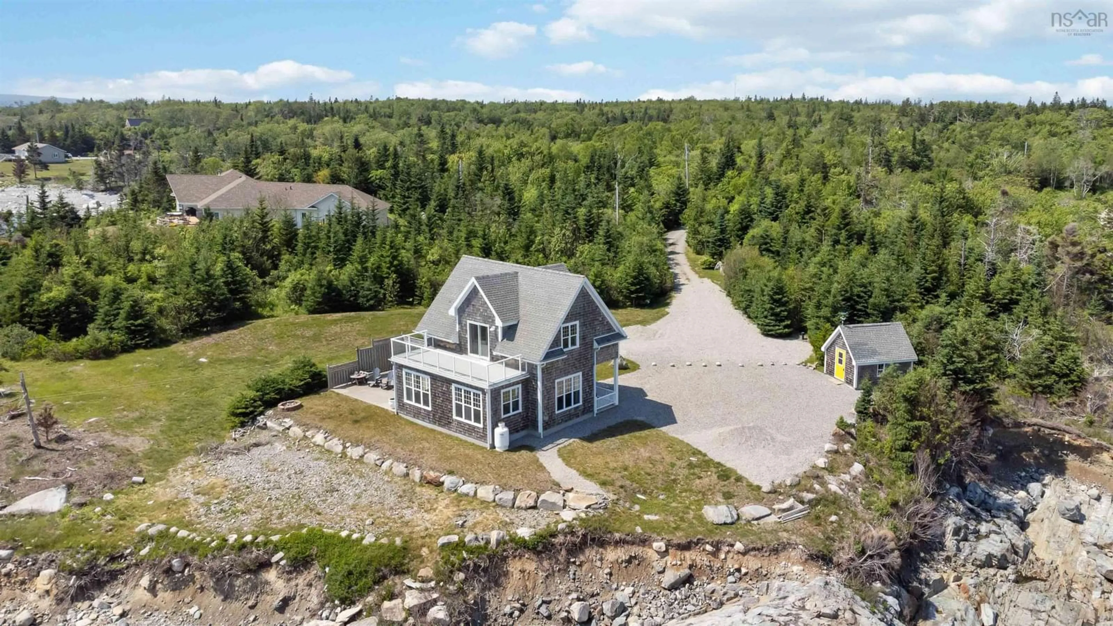 A pic from outside/outdoor area/front of a property/back of a property/a pic from drone, unknown for 24 Partridge Lane, Lower Sandy Point Nova Scotia B0T 1W0