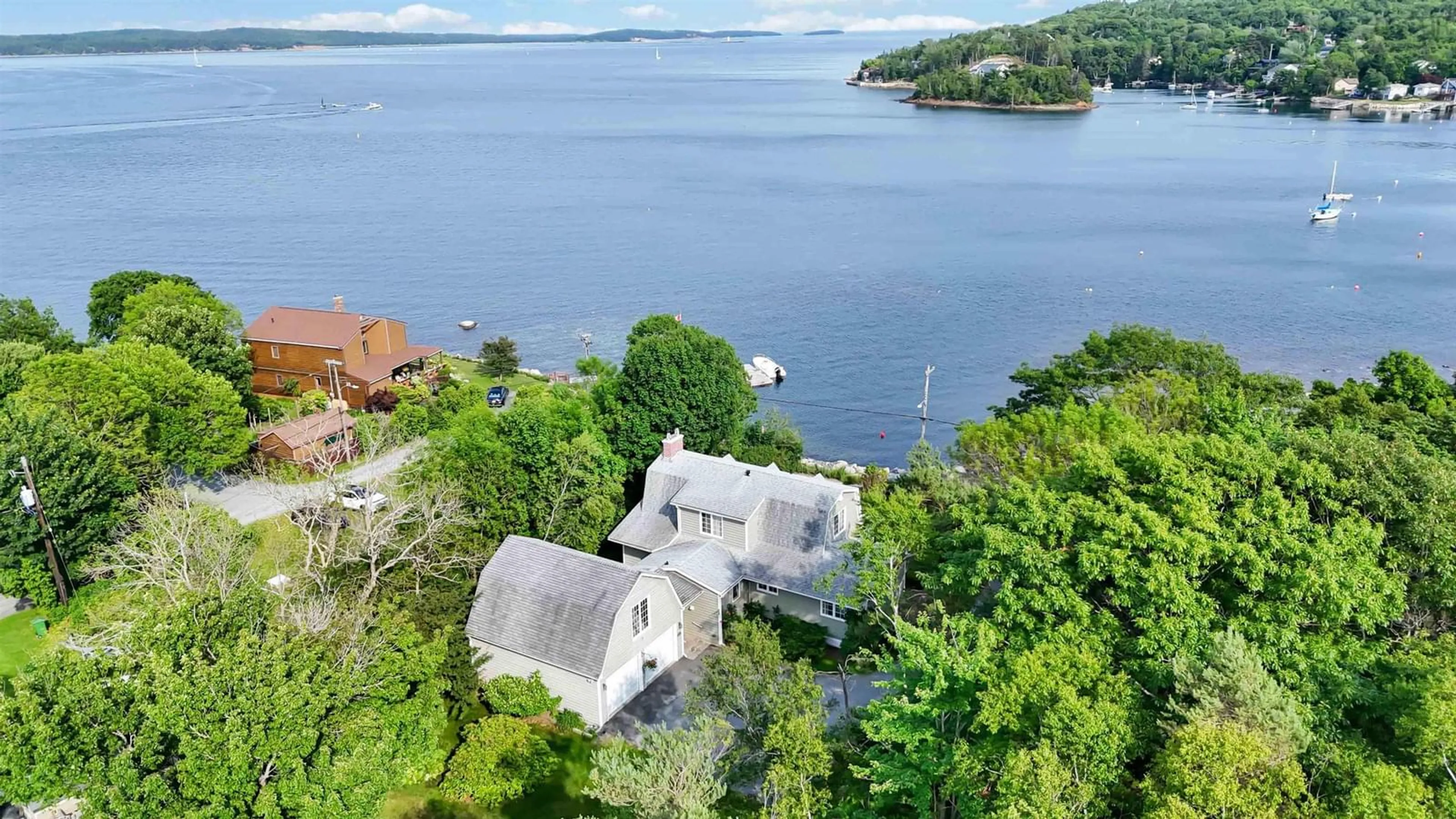 A pic from outside/outdoor area/front of a property/back of a property/a pic from drone, water/lake/river/ocean view for 11 Keefe Rd, Halifax Nova Scotia B3P 2J1
