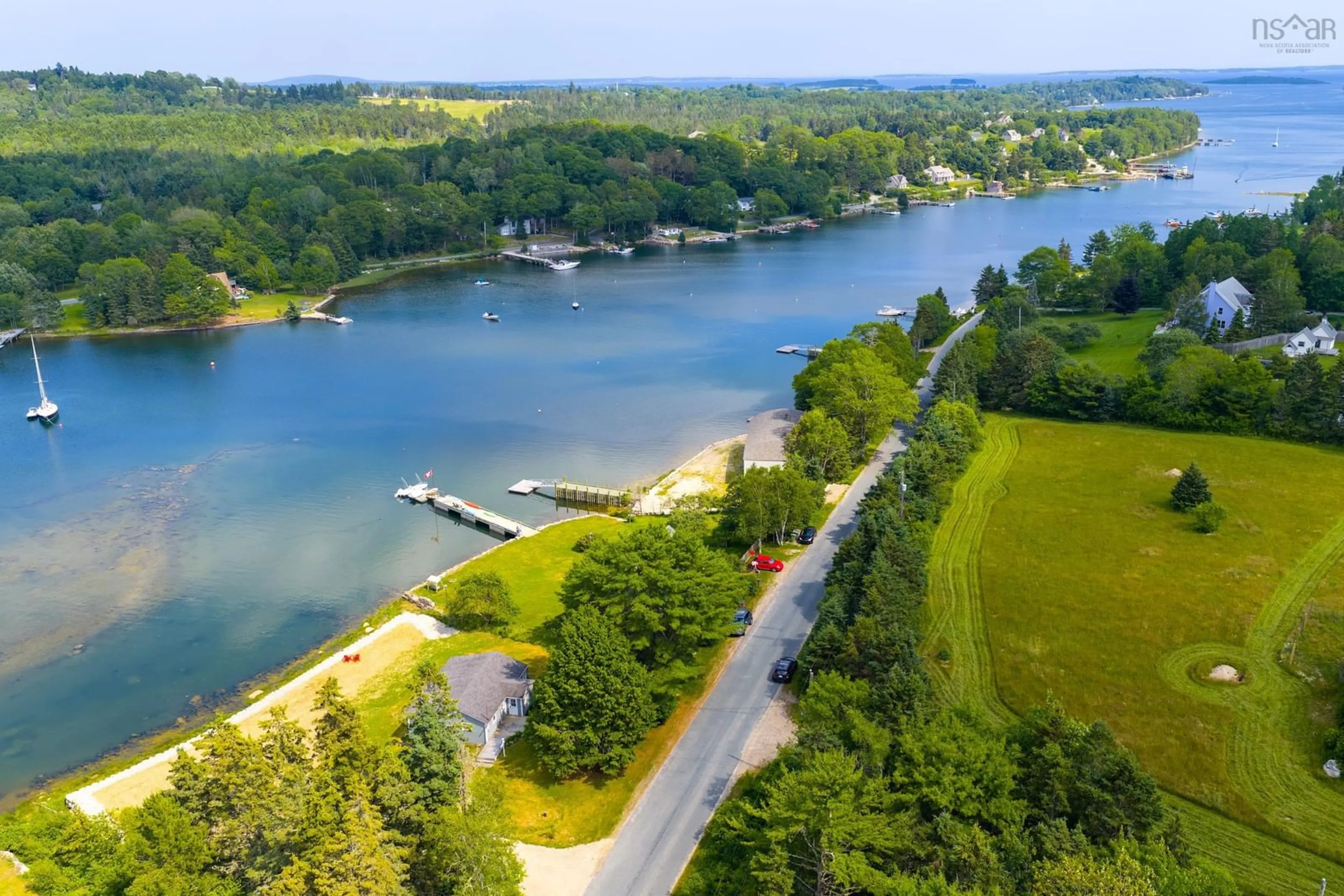 A pic from outside/outdoor area/front of a property/back of a property/a pic from drone, water/lake/river/ocean view for 147 Marriotts Cove Rd, Marriott's Cove Nova Scotia B0J 1J0