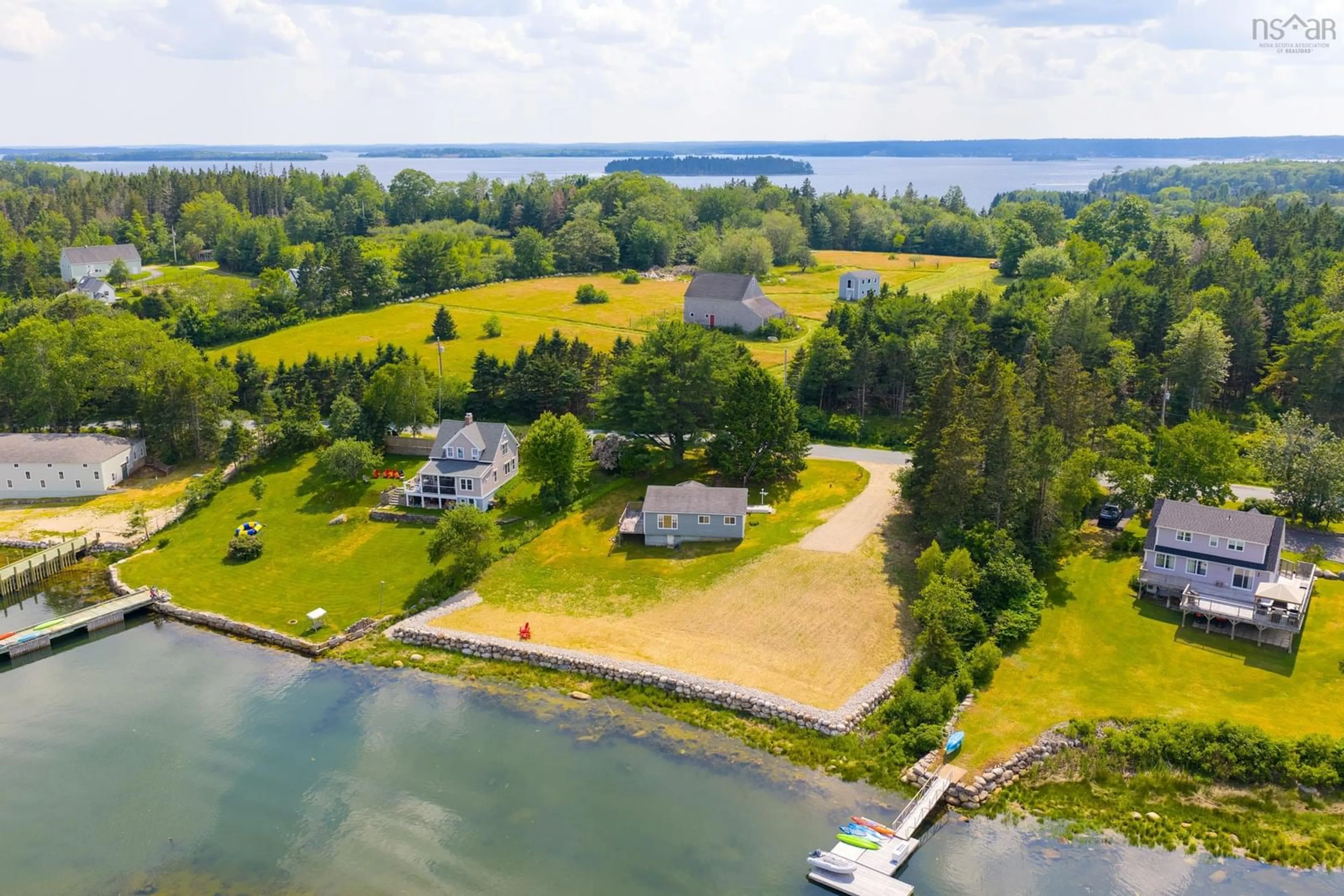 A pic from outside/outdoor area/front of a property/back of a property/a pic from drone, water/lake/river/ocean view for 147 Marriotts Cove Rd, Marriott's Cove Nova Scotia B0J 1J0