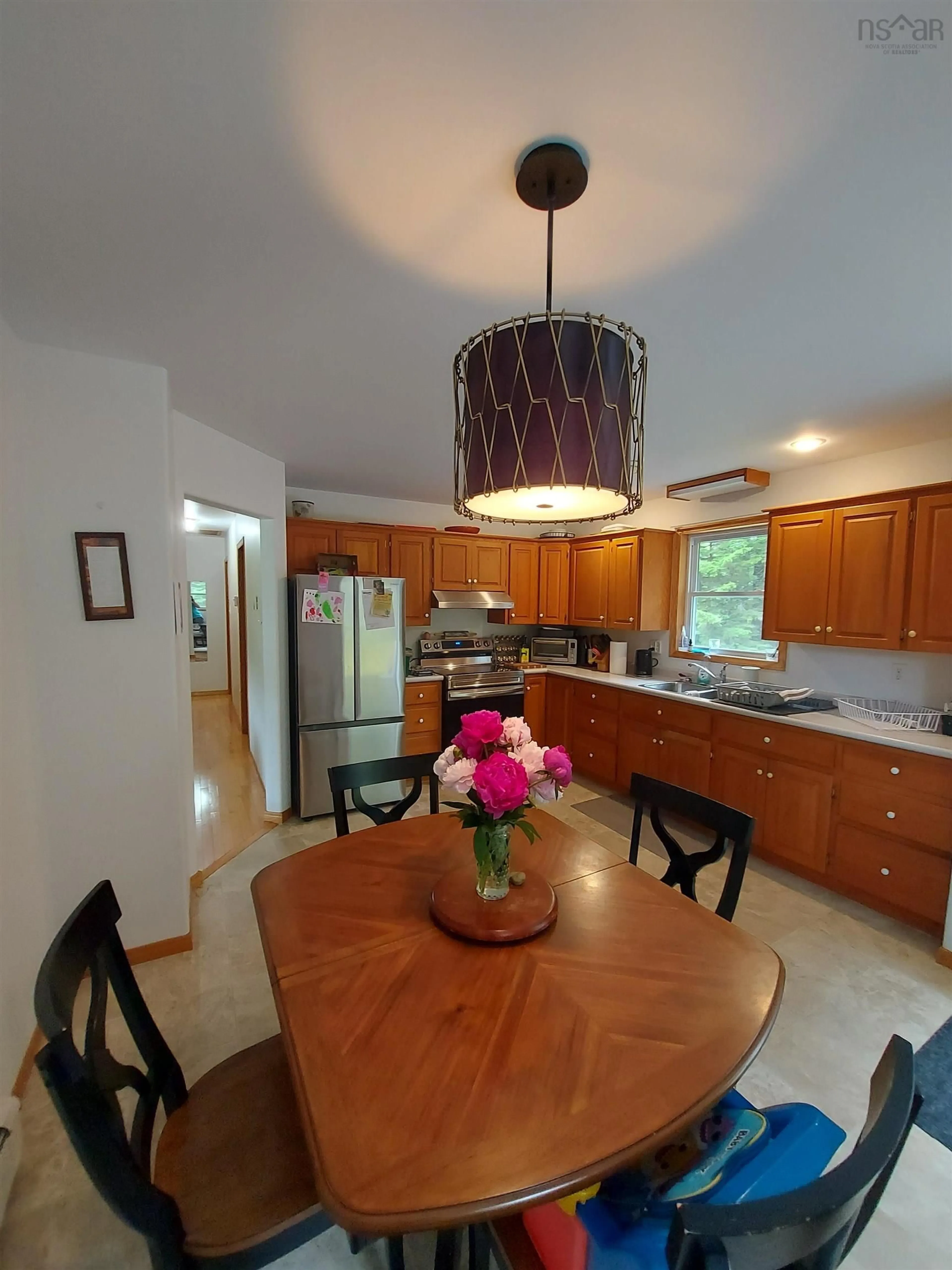 Open concept kitchen, wood/laminate floor for 422 Middle River Rd, Marriott's Cove Nova Scotia B0J 1T0