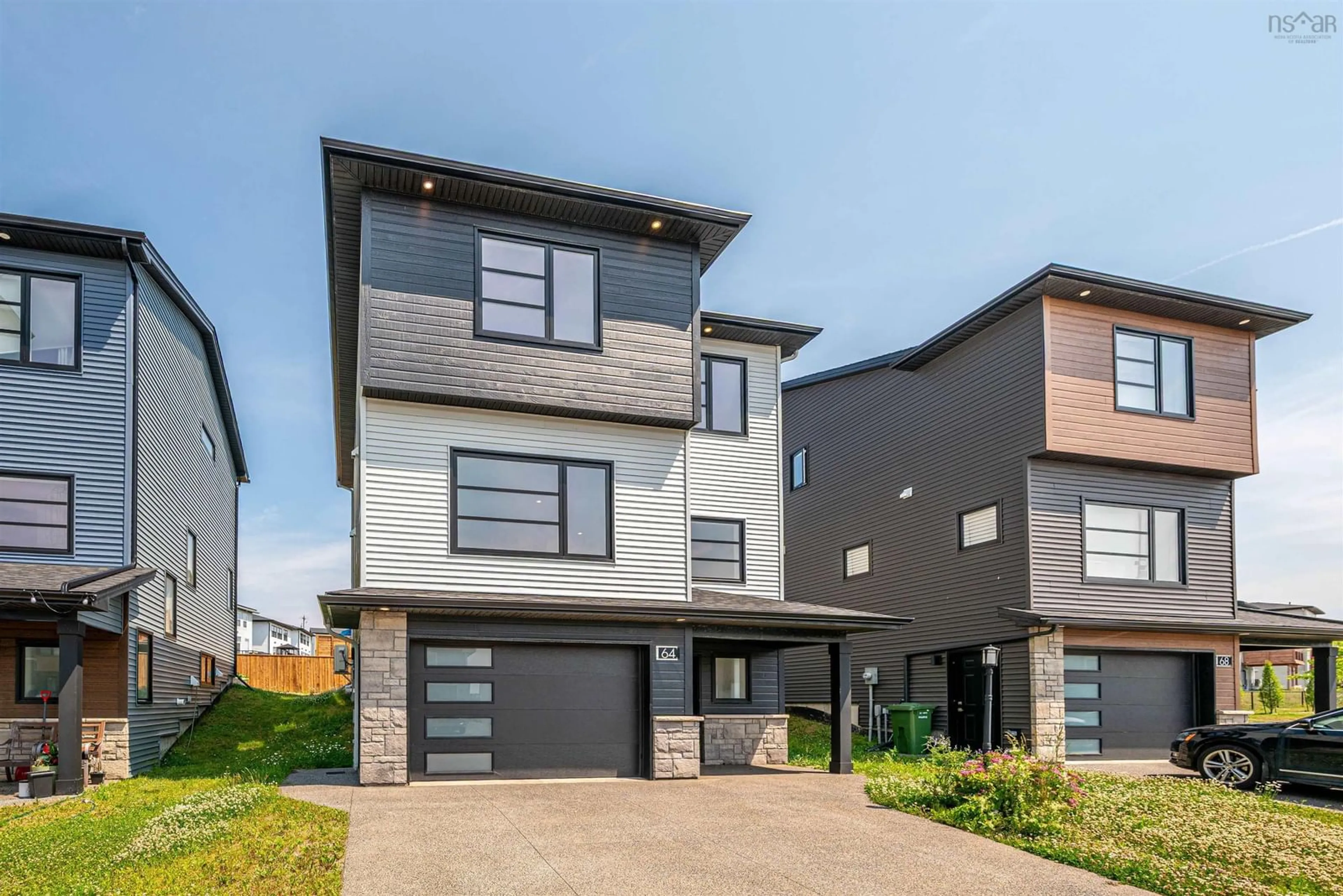 Home with brick exterior material, street for 64 Tuscany Run, Timberlea Nova Scotia B3T 0G9
