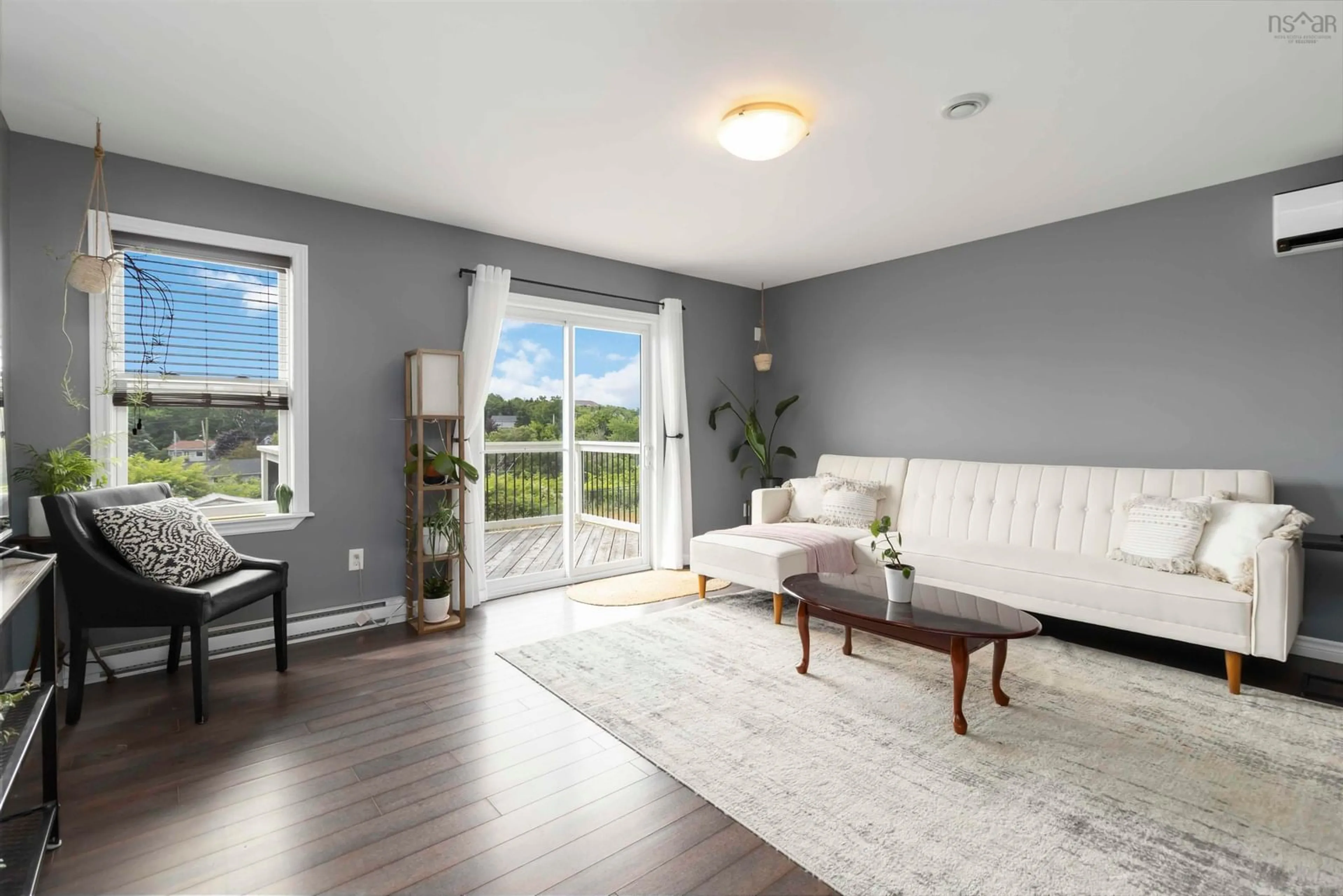 Living room with furniture, wood/laminate floor for 31 Halef Crt, Halifax Nova Scotia B3N 0C1