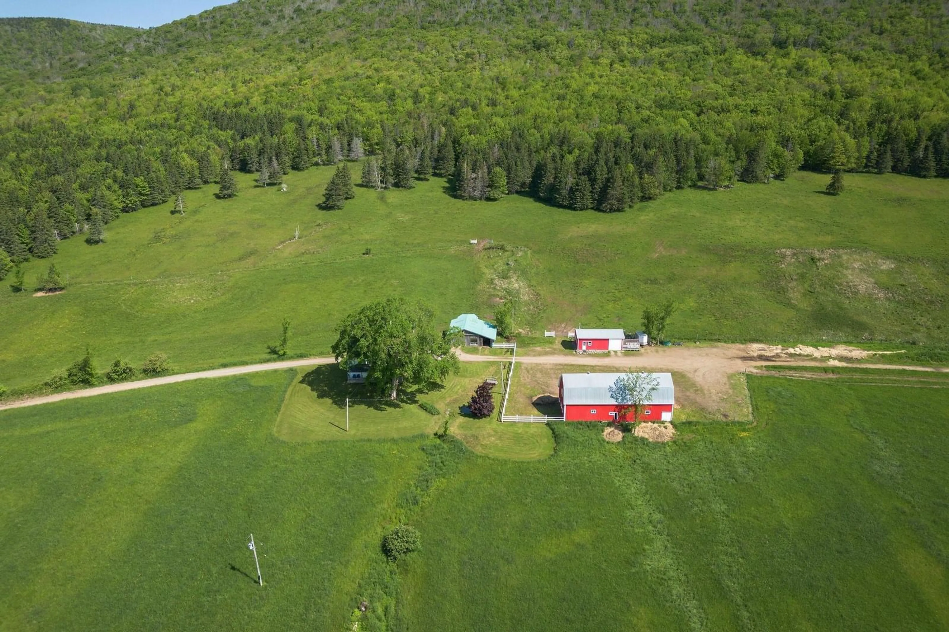 A pic from outside/outdoor area/front of a property/back of a property/a pic from drone, mountain view for 380 Northeast Mabou Rd, Northeast Mabou Nova Scotia B0E 1X0