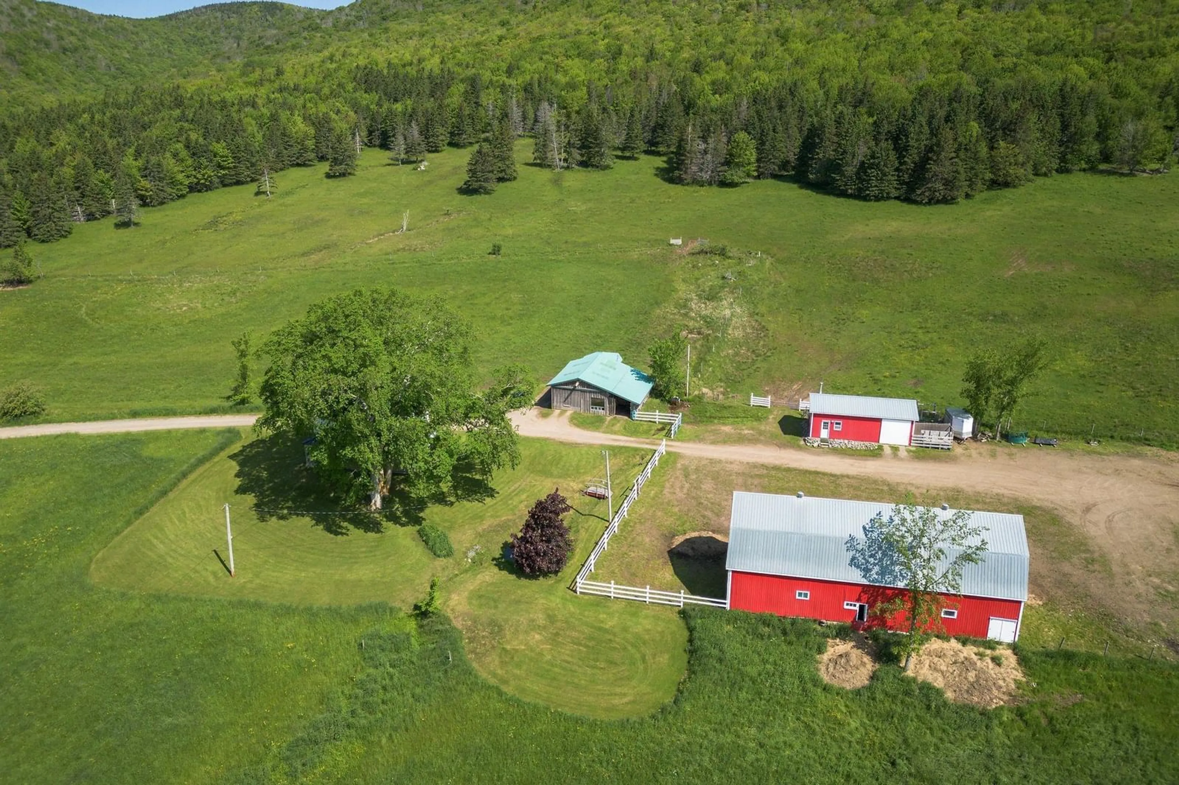 A pic from outside/outdoor area/front of a property/back of a property/a pic from drone, mountain view for 380 Northeast Mabou Rd, Northeast Mabou Nova Scotia B0E 1X0