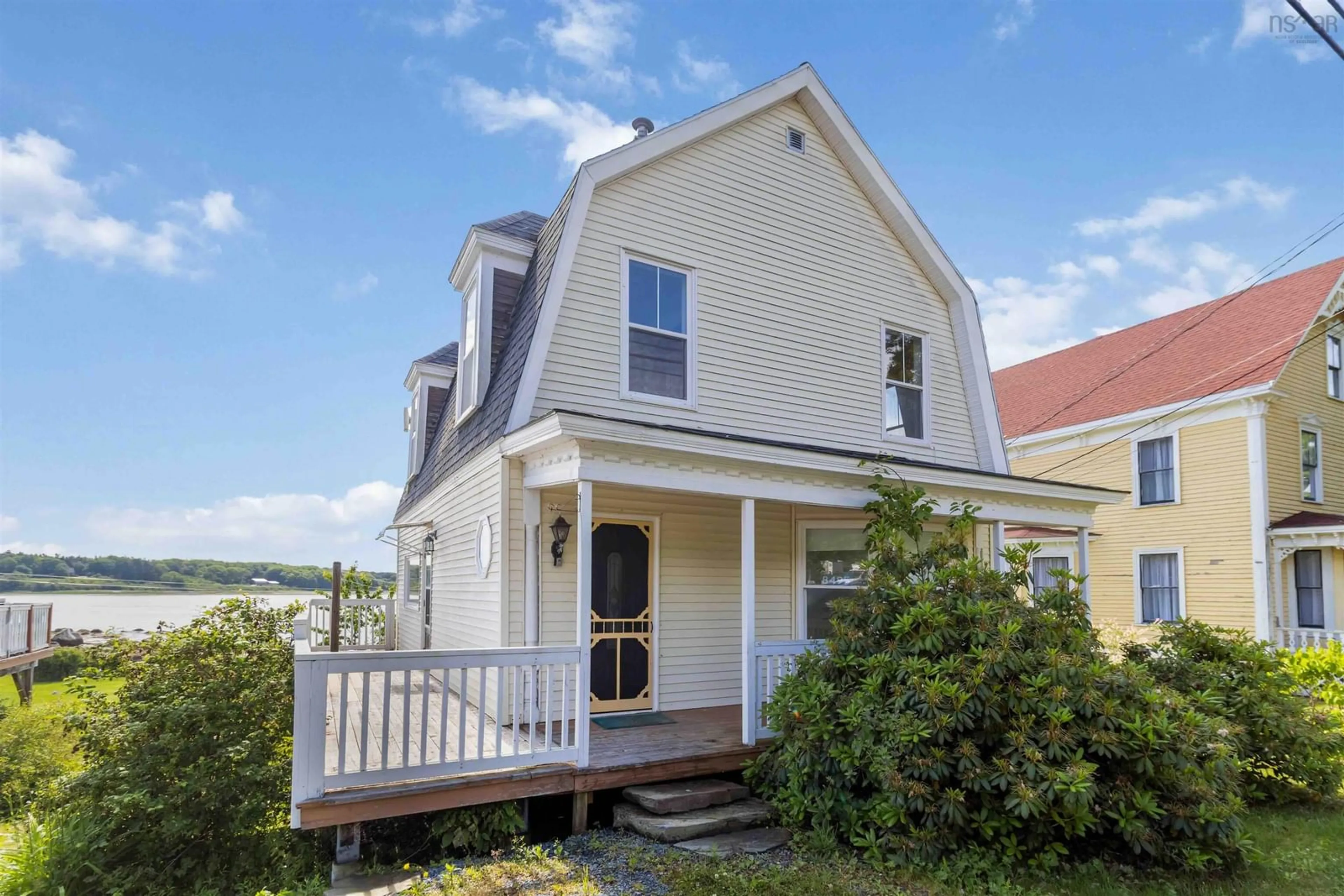 Home with vinyl exterior material, street for 8495 Highway 3, Port Mouton Nova Scotia B0T 1T0