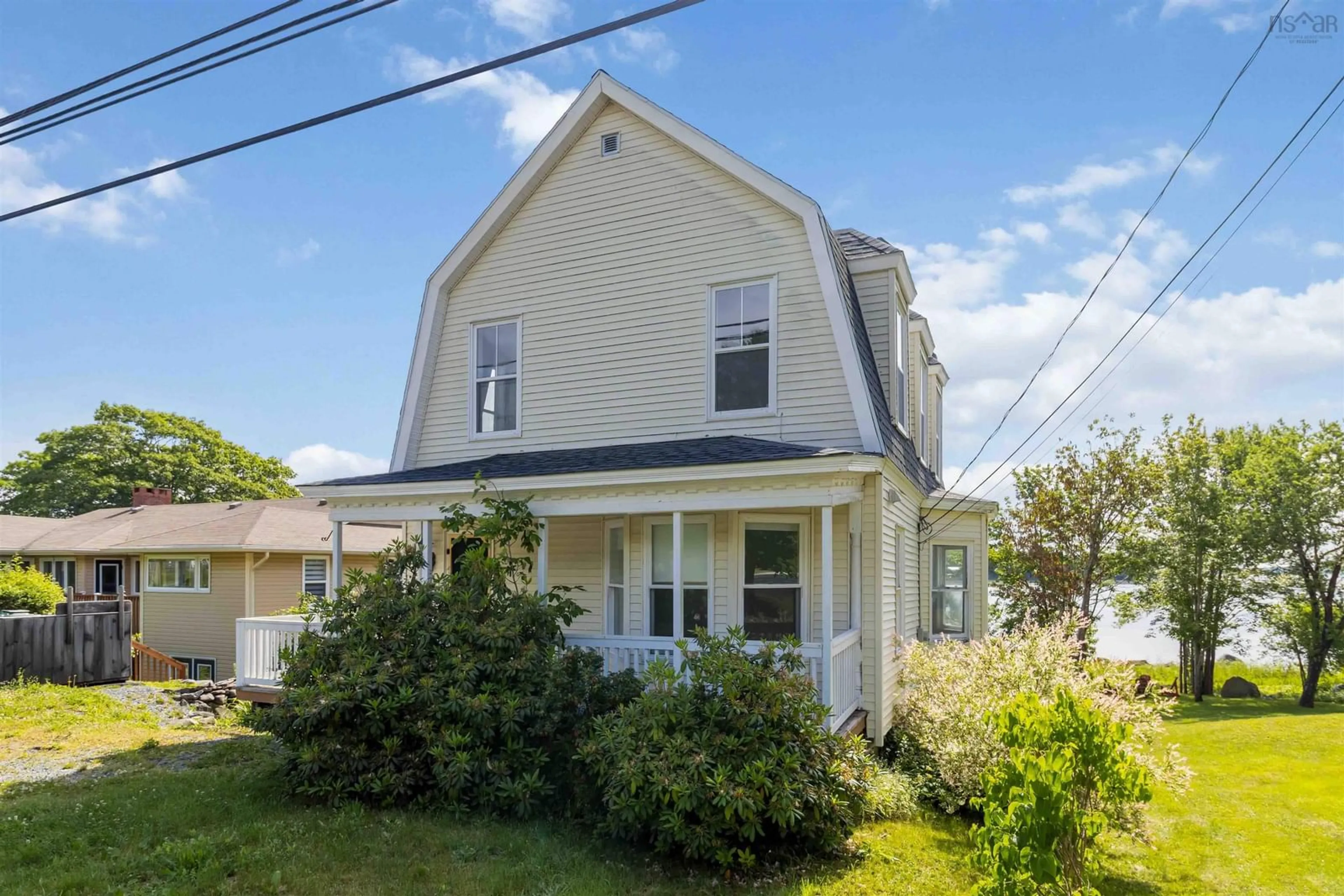 Home with vinyl exterior material, street for 8495 Highway 3, Port Mouton Nova Scotia B0T 1T0