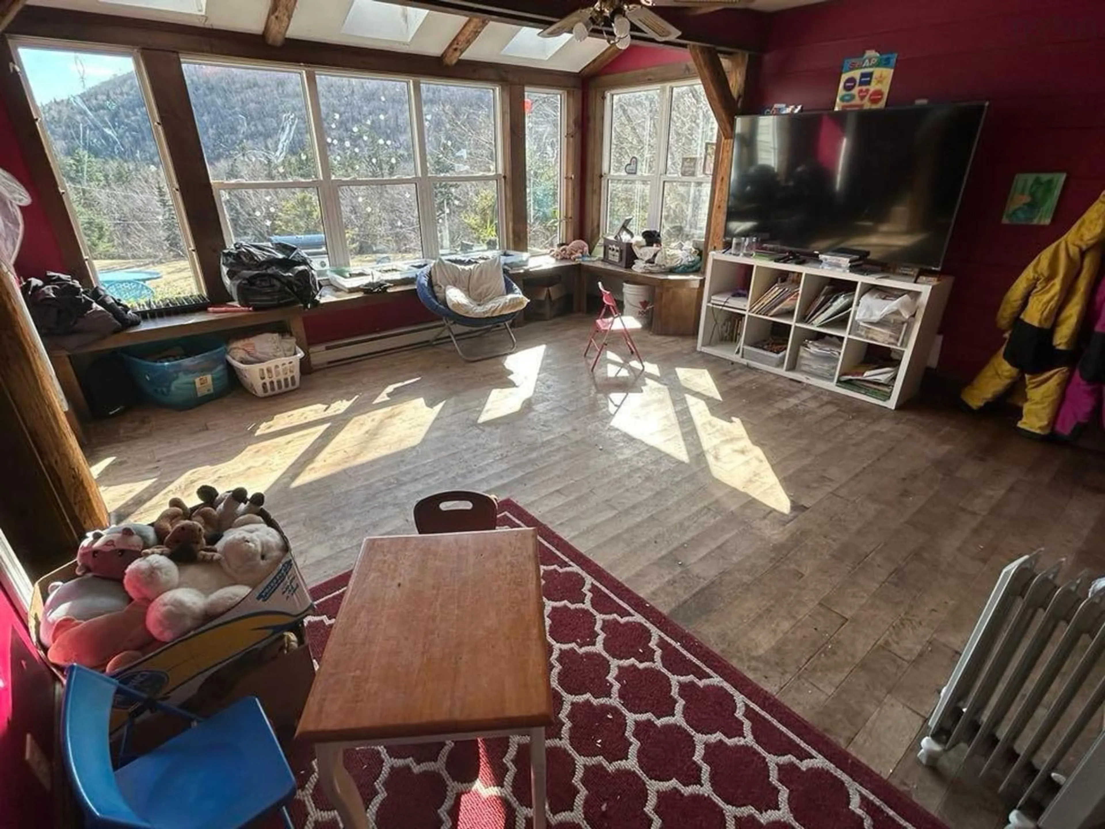 Living room with furniture, unknown for 49 Rear Barachois Rd., Englishtown Nova Scotia B0E 1B0