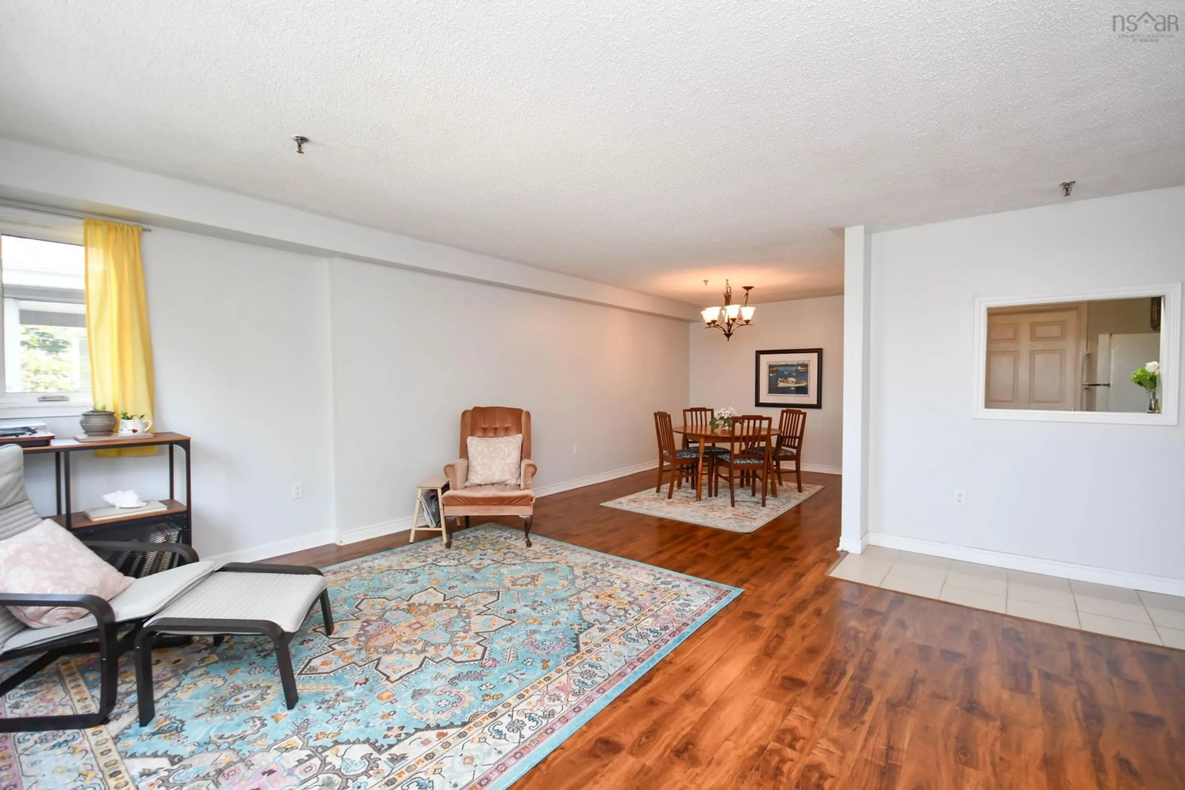 Living room with furniture, wood/laminate floor for 118 Farnham Gate Rd #307, Halifax Nova Scotia B3M 4A1