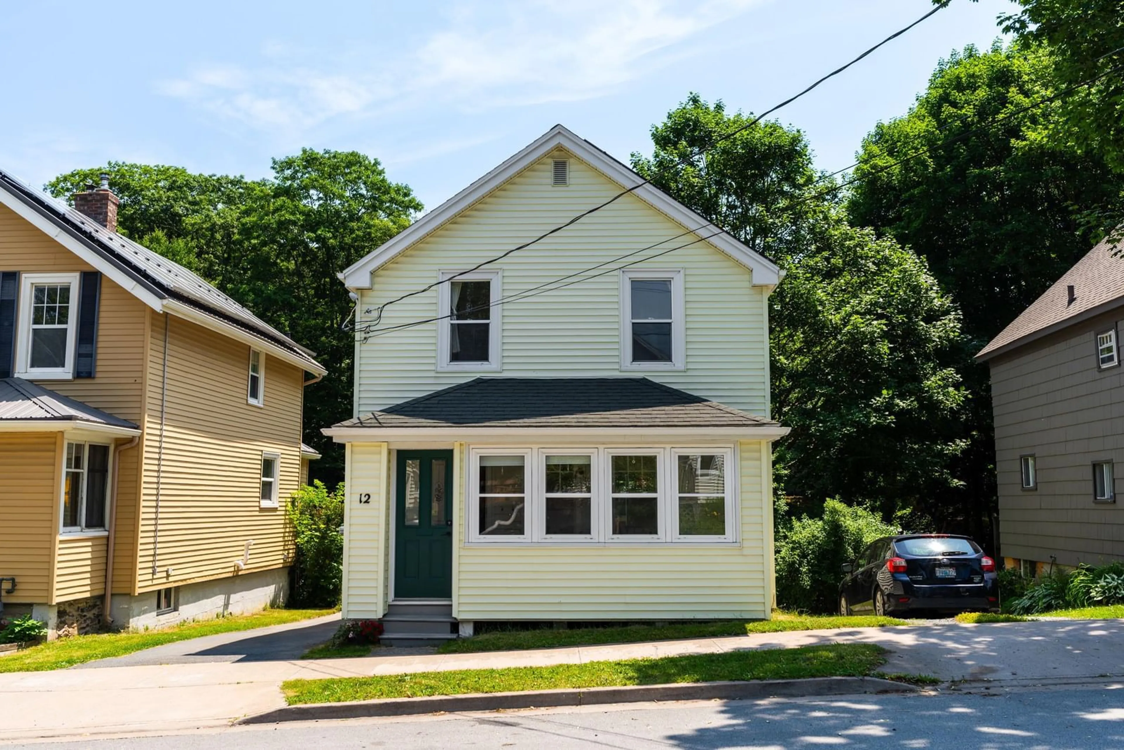 Home with vinyl exterior material, street for 12 Sinclair St, Dartmouth Nova Scotia B2Y 1R8