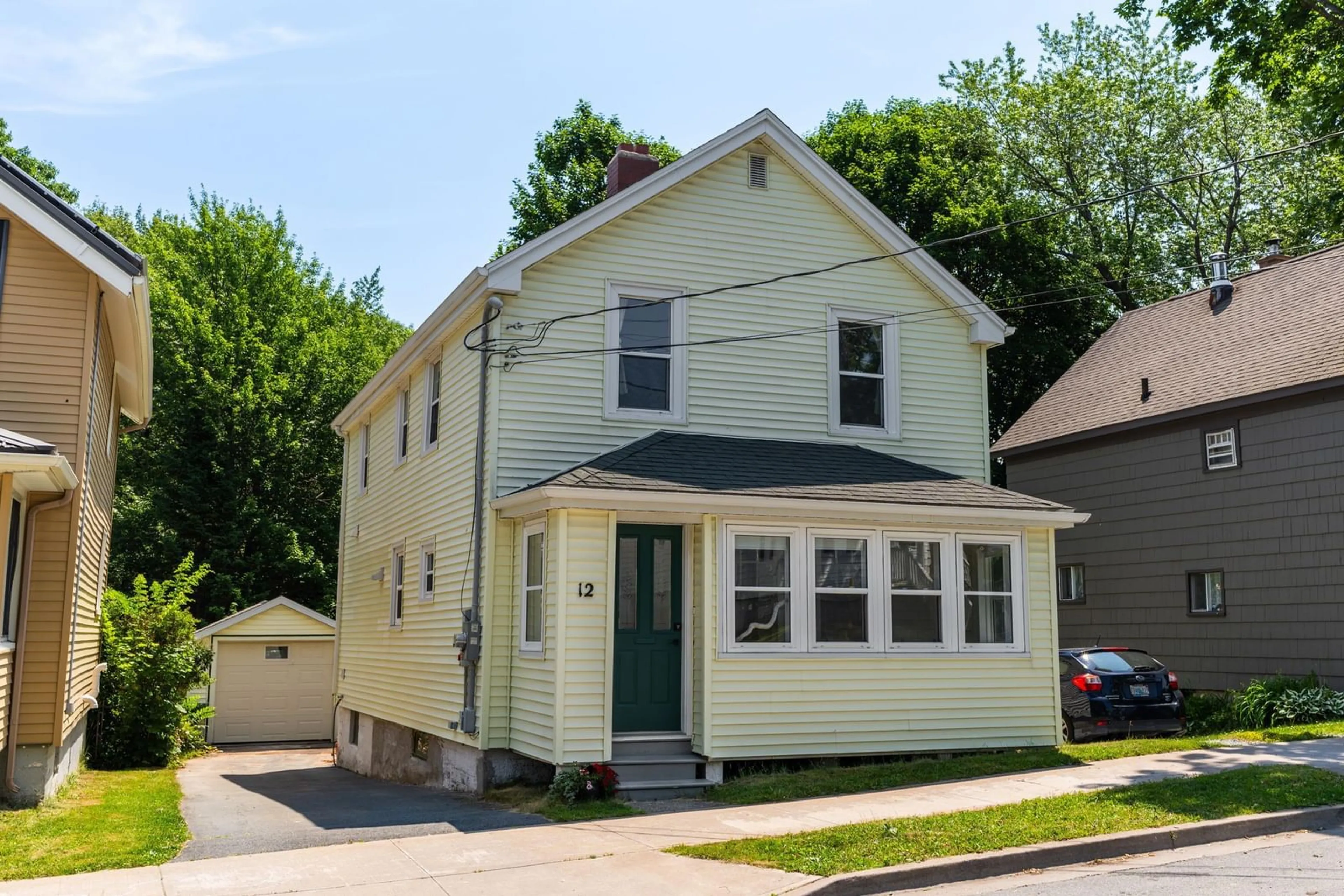 Home with vinyl exterior material, street for 12 Sinclair St, Dartmouth Nova Scotia B2Y 1R8