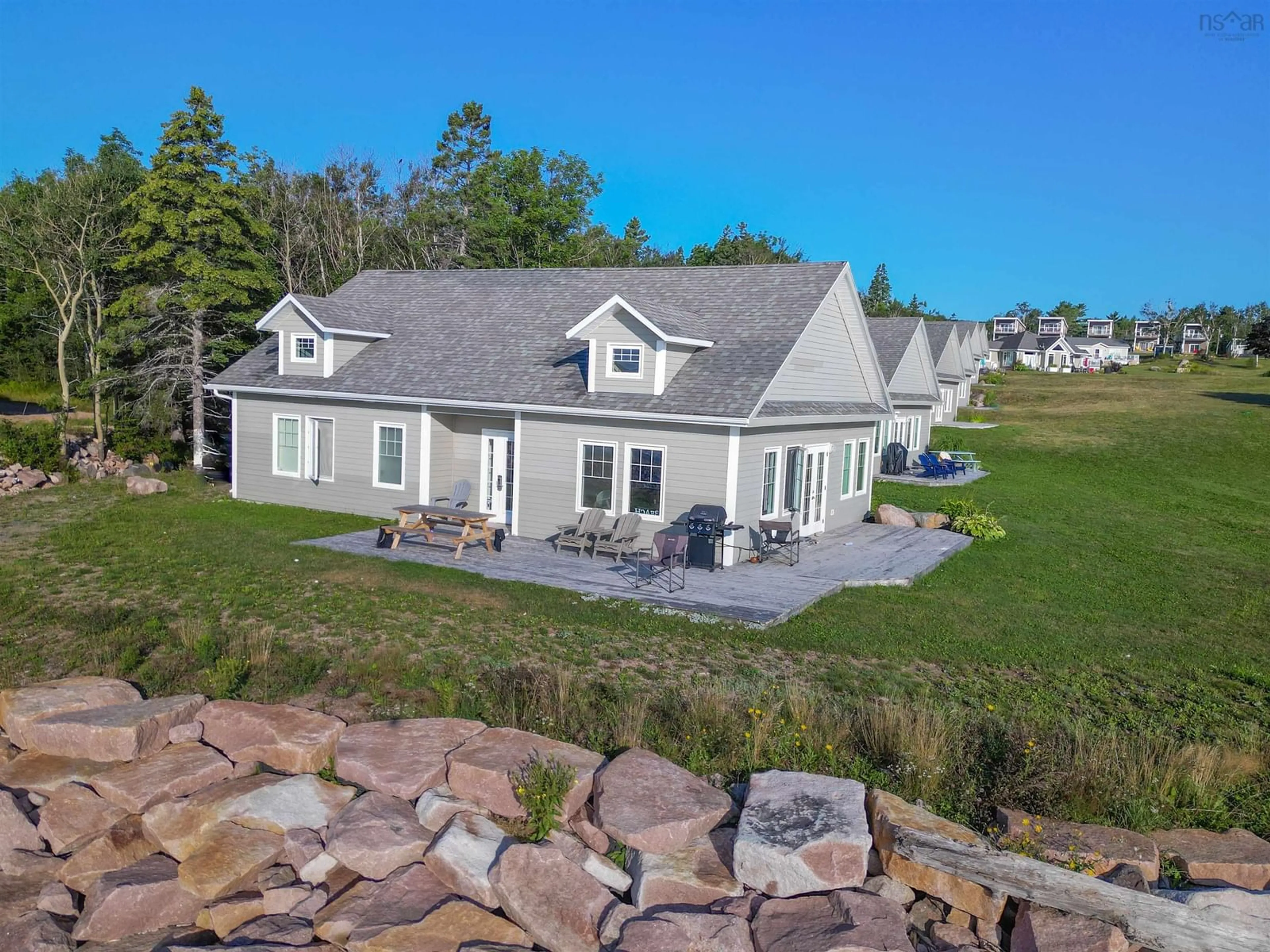 A pic from outside/outdoor area/front of a property/back of a property/a pic from drone, water/lake/river/ocean view for 36785 Cabot Trail, Ingonish Nova Scotia B0K 1K0