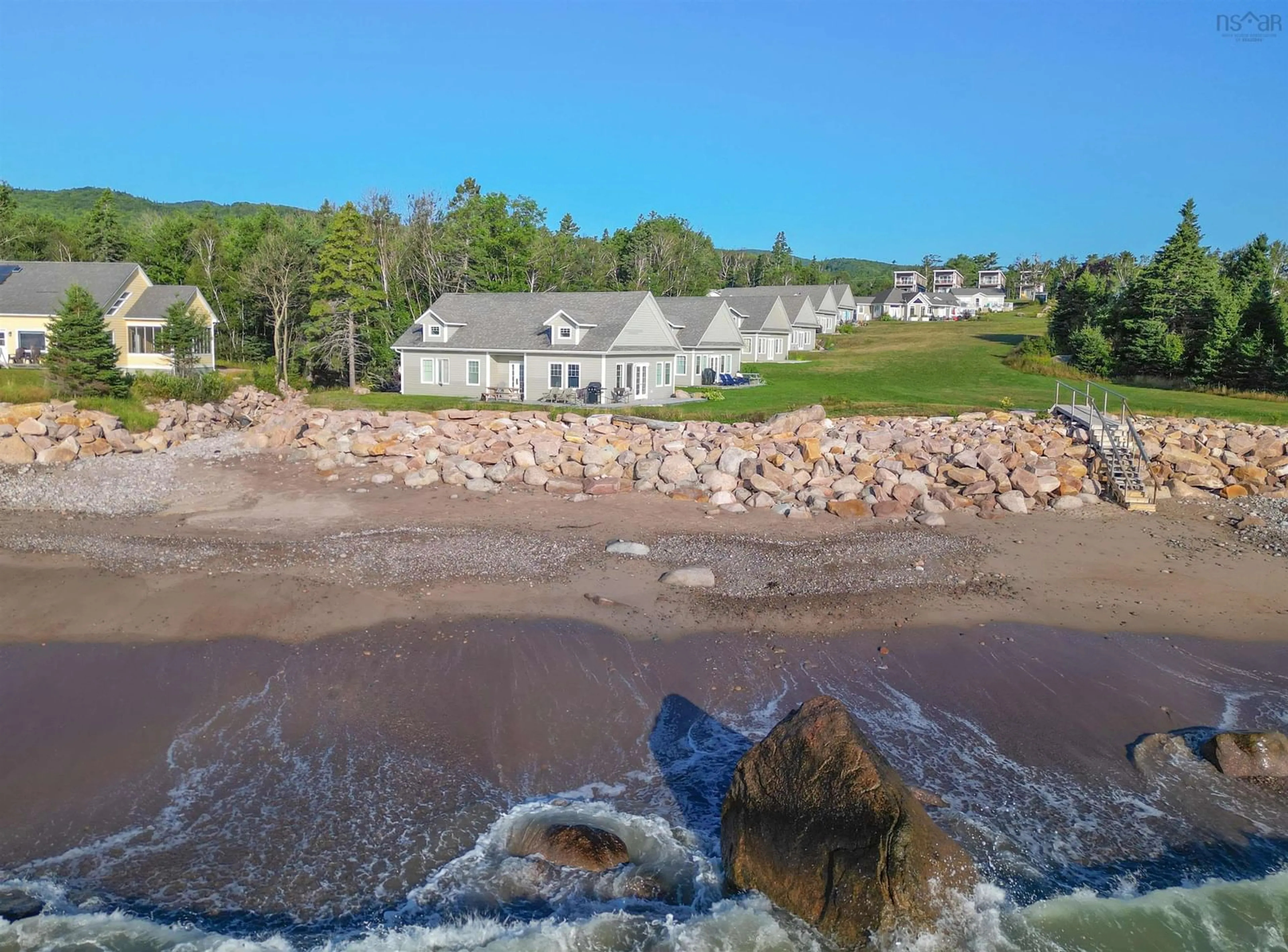 A pic from outside/outdoor area/front of a property/back of a property/a pic from drone, water/lake/river/ocean view for 36785 Cabot Trail, Ingonish Nova Scotia B0K 1K0