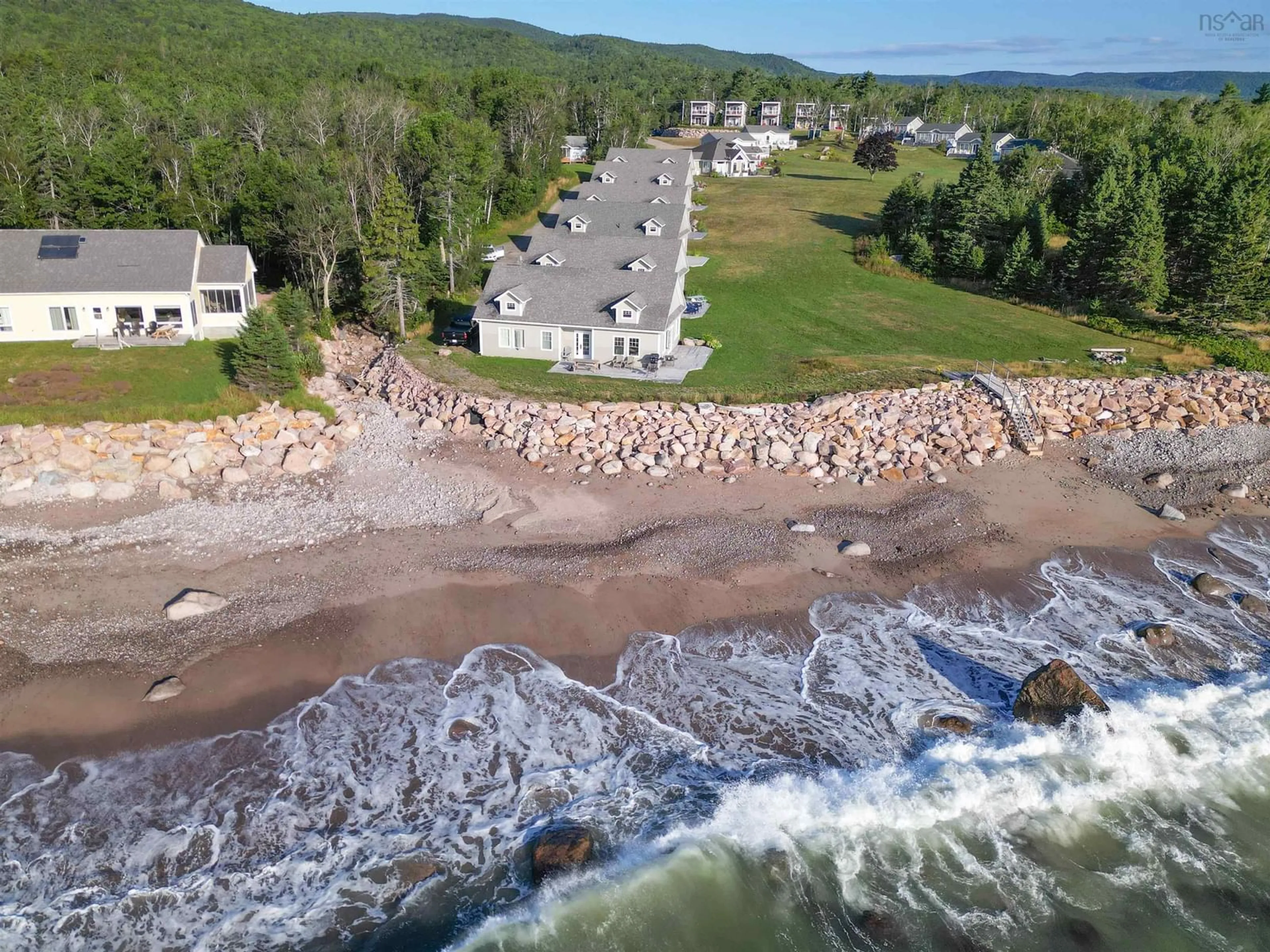 A pic from outside/outdoor area/front of a property/back of a property/a pic from drone, water/lake/river/ocean view for 36785 Cabot Trail, Ingonish Nova Scotia B0K 1K0