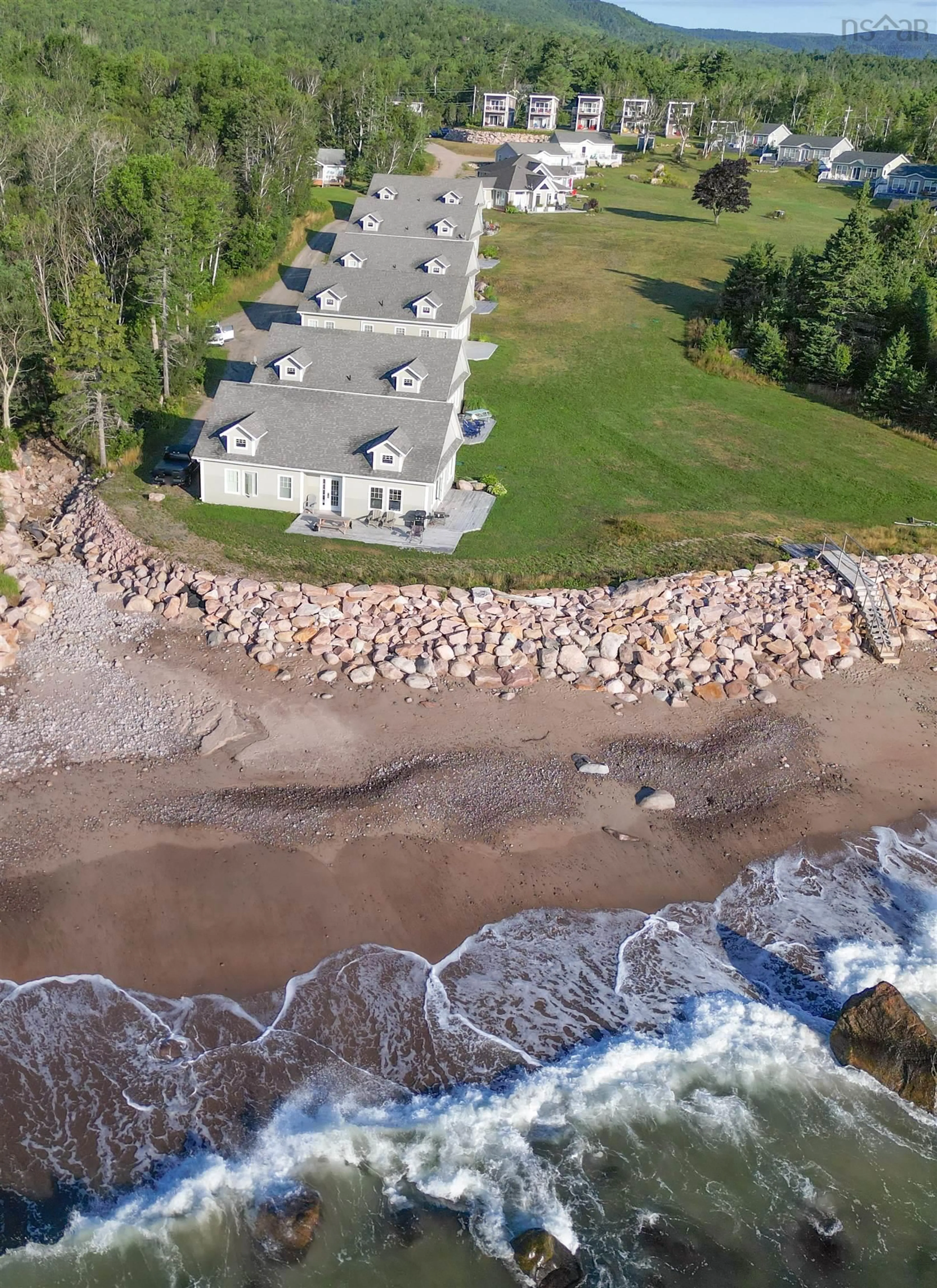 A pic from outside/outdoor area/front of a property/back of a property/a pic from drone, water/lake/river/ocean view for 36785 Cabot Trail, Ingonish Nova Scotia B0K 1K0