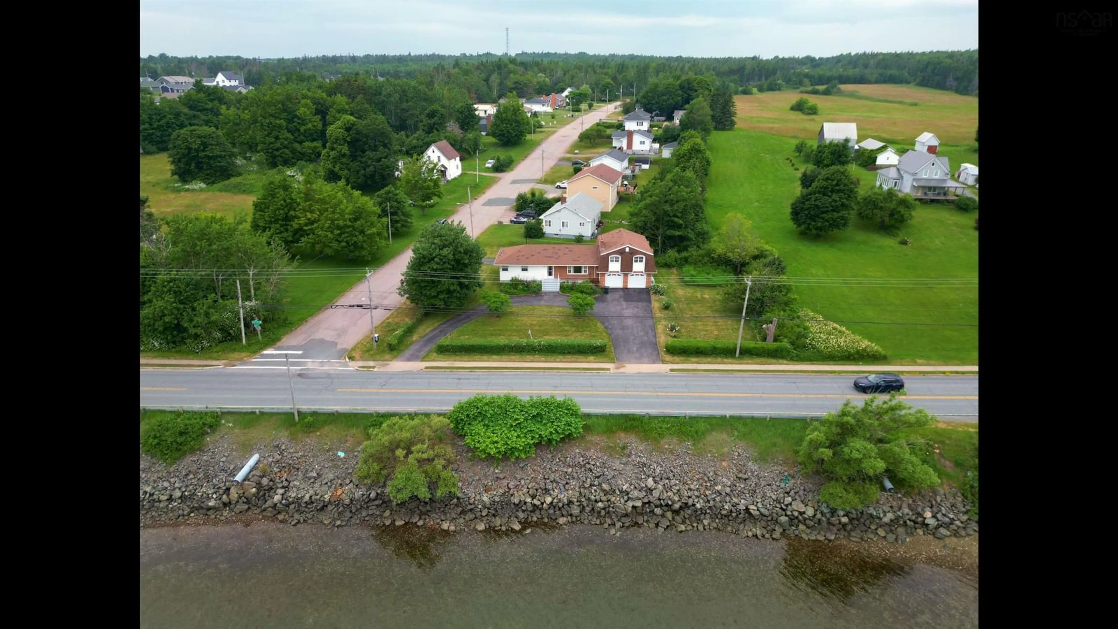 A pic from outside/outdoor area/front of a property/back of a property/a pic from drone, water/lake/river/ocean view for 247 Westmount Road, Westmount Nova Scotia B1R 1A3