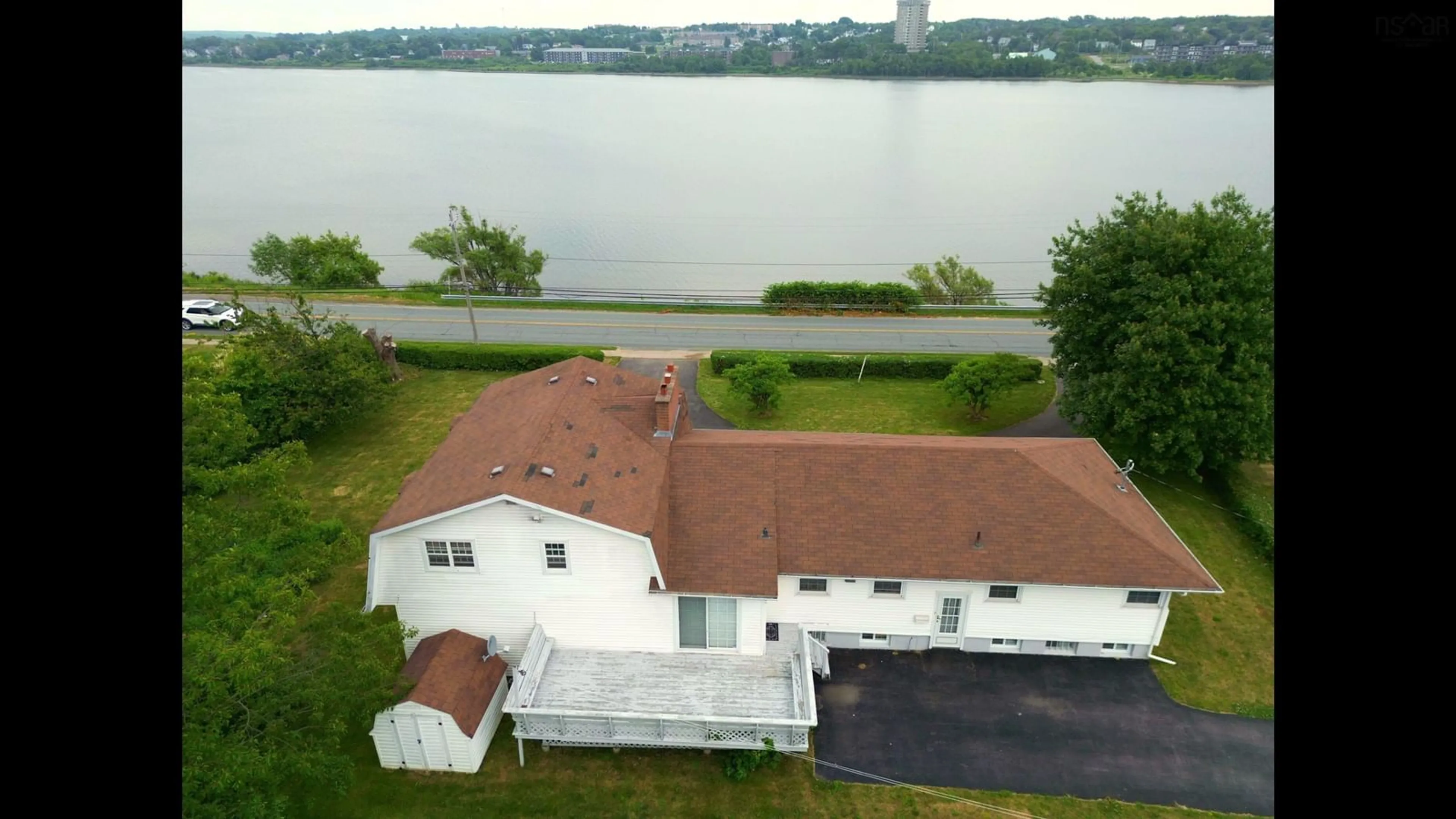 A pic from outside/outdoor area/front of a property/back of a property/a pic from drone, water/lake/river/ocean view for 247 Westmount Road, Westmount Nova Scotia B1R 1A3
