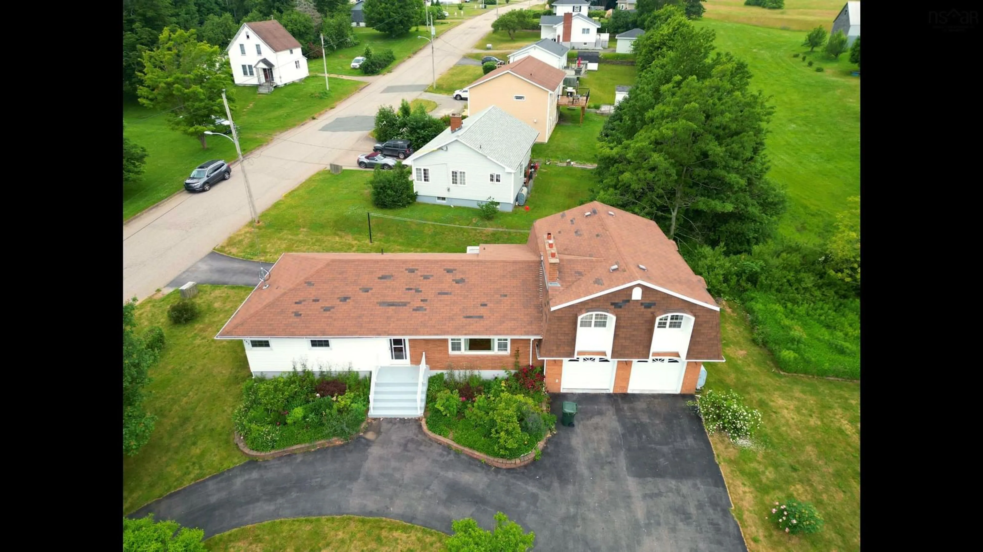 A pic from outside/outdoor area/front of a property/back of a property/a pic from drone, street for 247 Westmount Road, Westmount Nova Scotia B1R 1A3