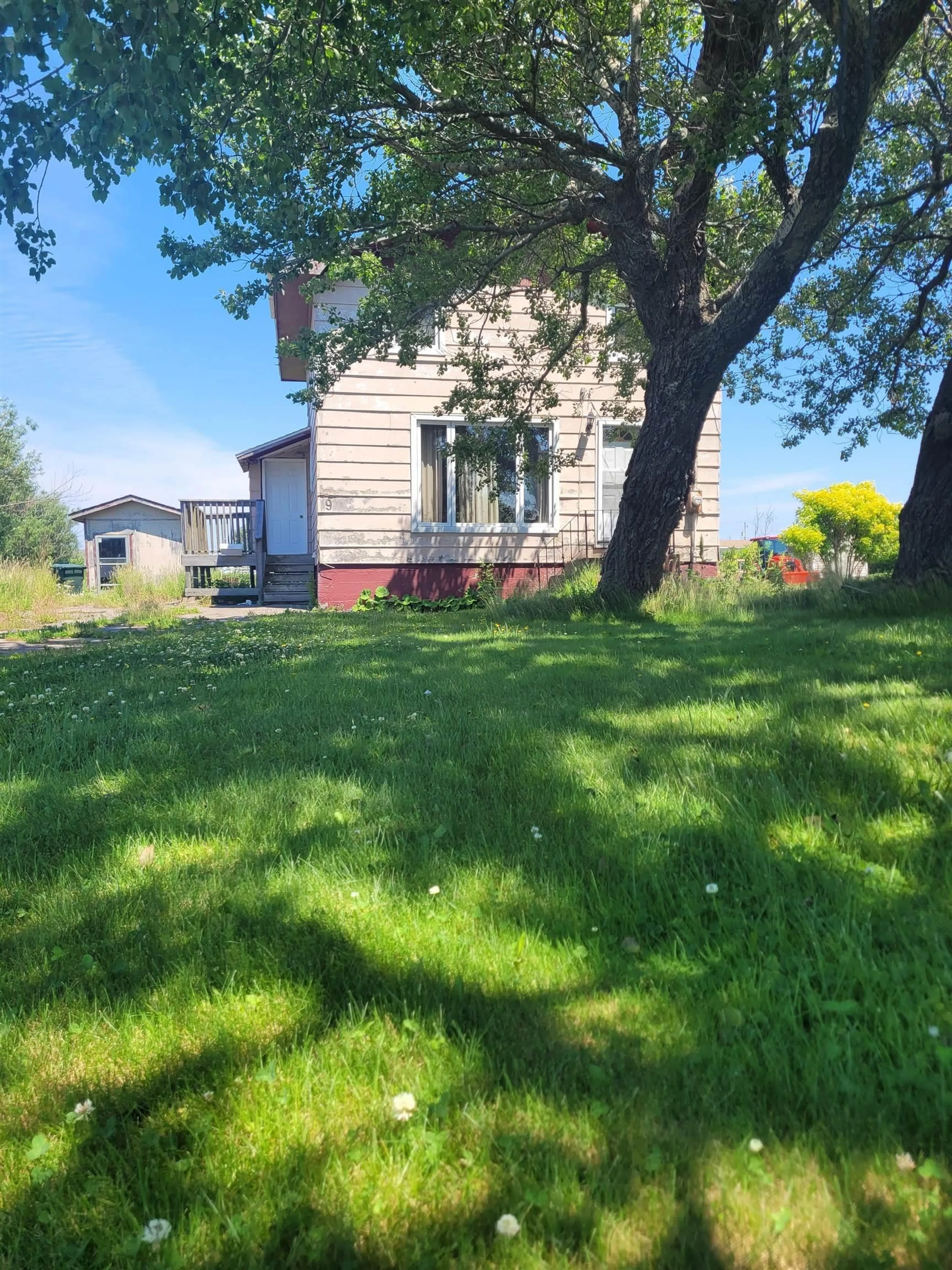 A pic from outside/outdoor area/front of a property/back of a property/a pic from drone, street for 9 Mello St, Glace Bay Nova Scotia B1A 1S8
