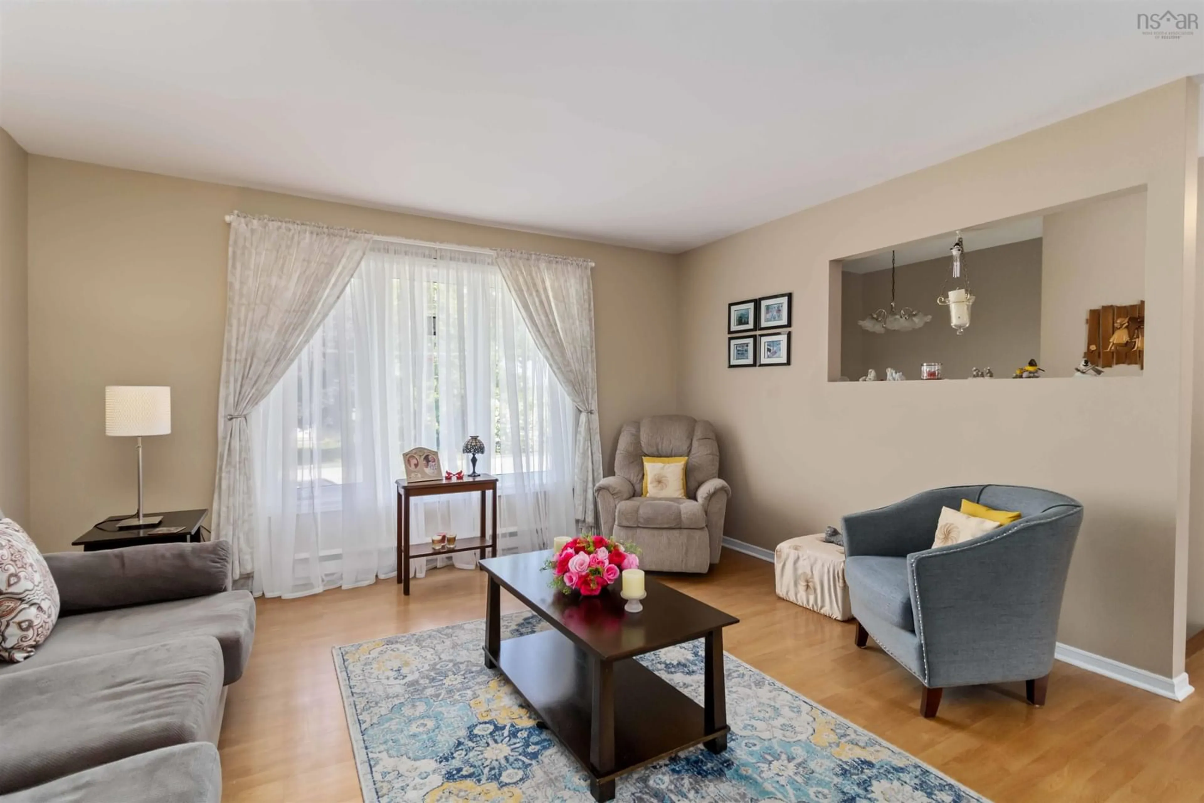 Living room with furniture, wood/laminate floor for 24 Barbara Dr, Dartmouth Nova Scotia B2W 3N6
