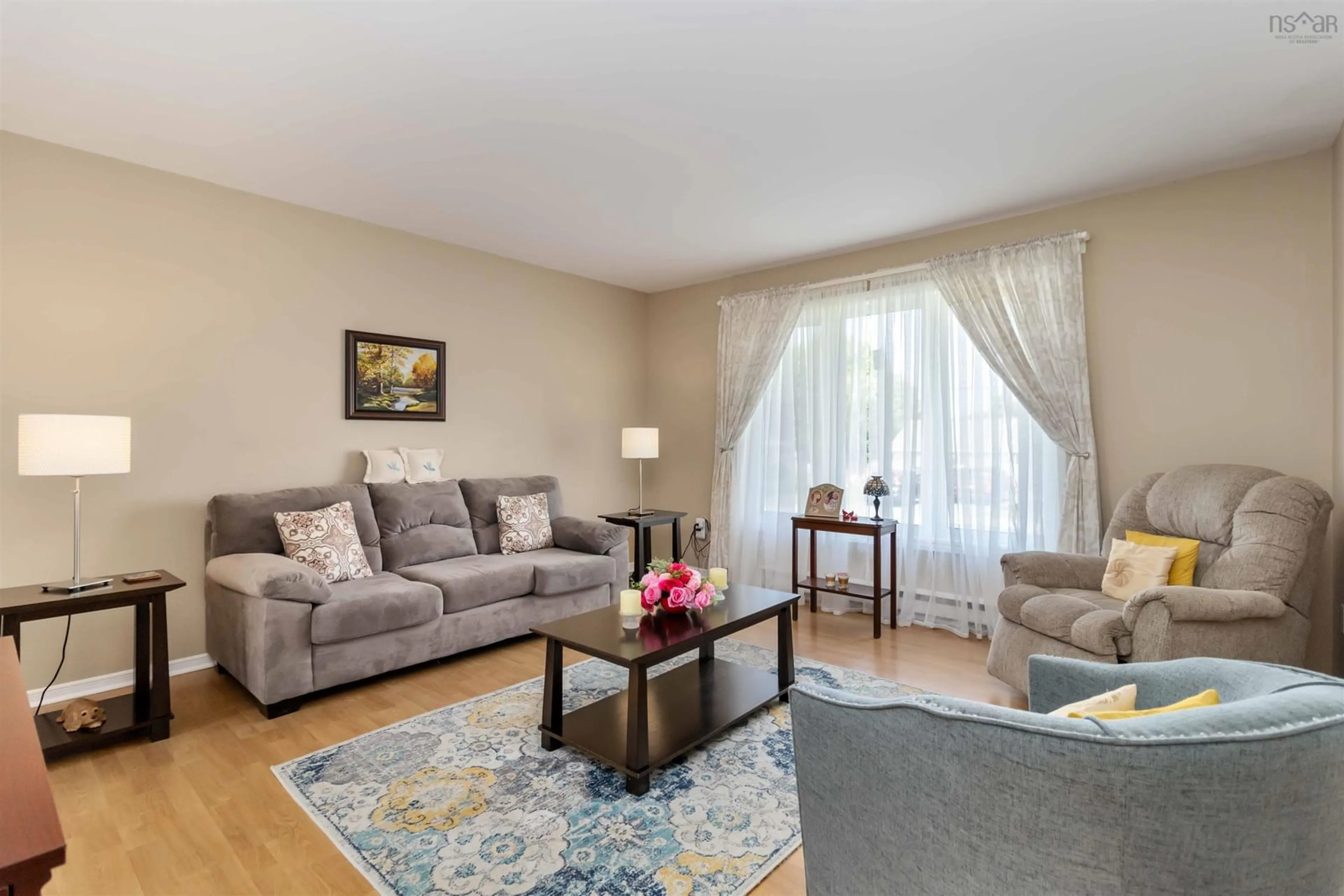 Living room with furniture, wood/laminate floor for 24 Barbara Dr, Dartmouth Nova Scotia B2W 3N6