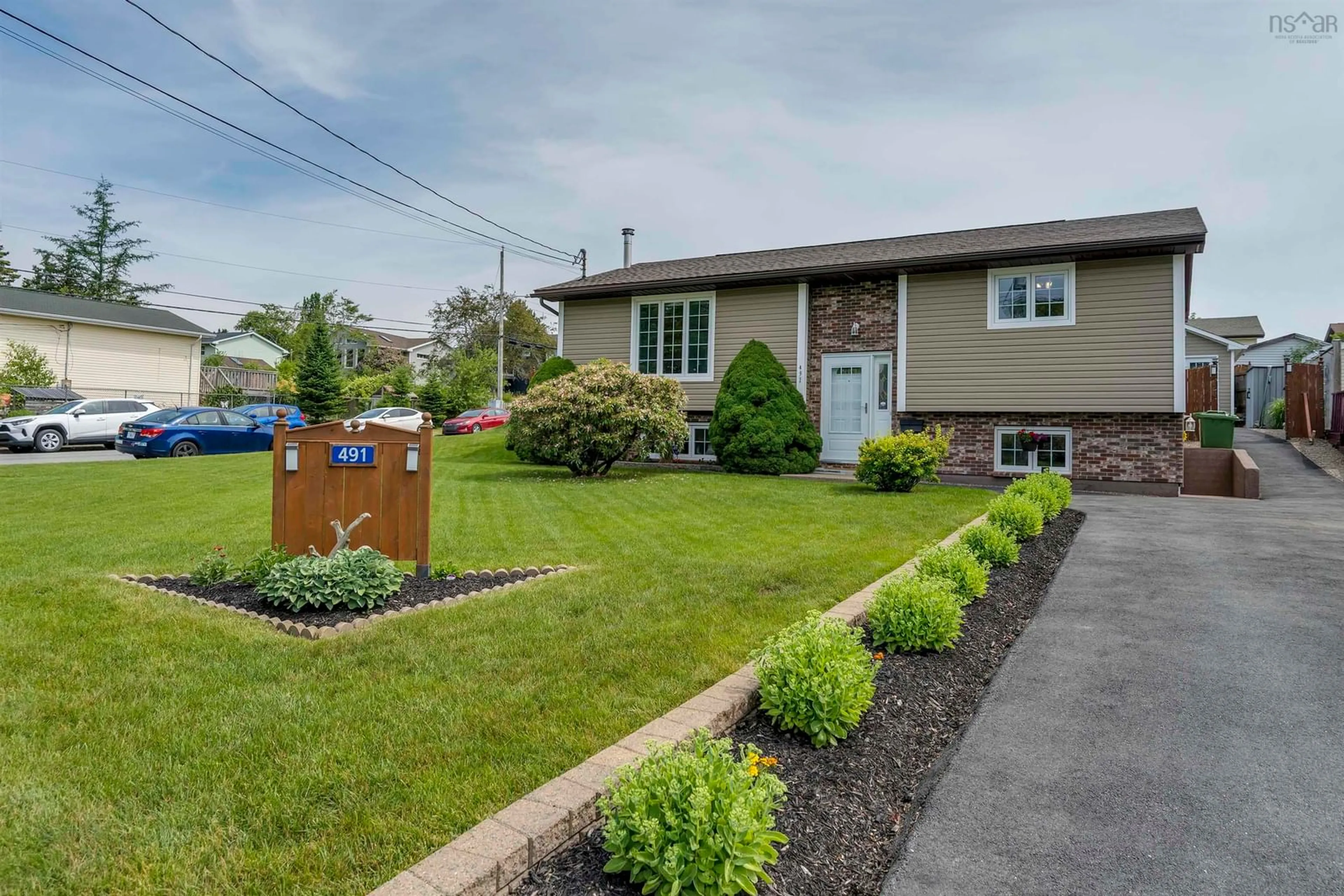 Home with vinyl exterior material, street for 491 Arklow Dr, Dartmouth Nova Scotia B2W 4Z5