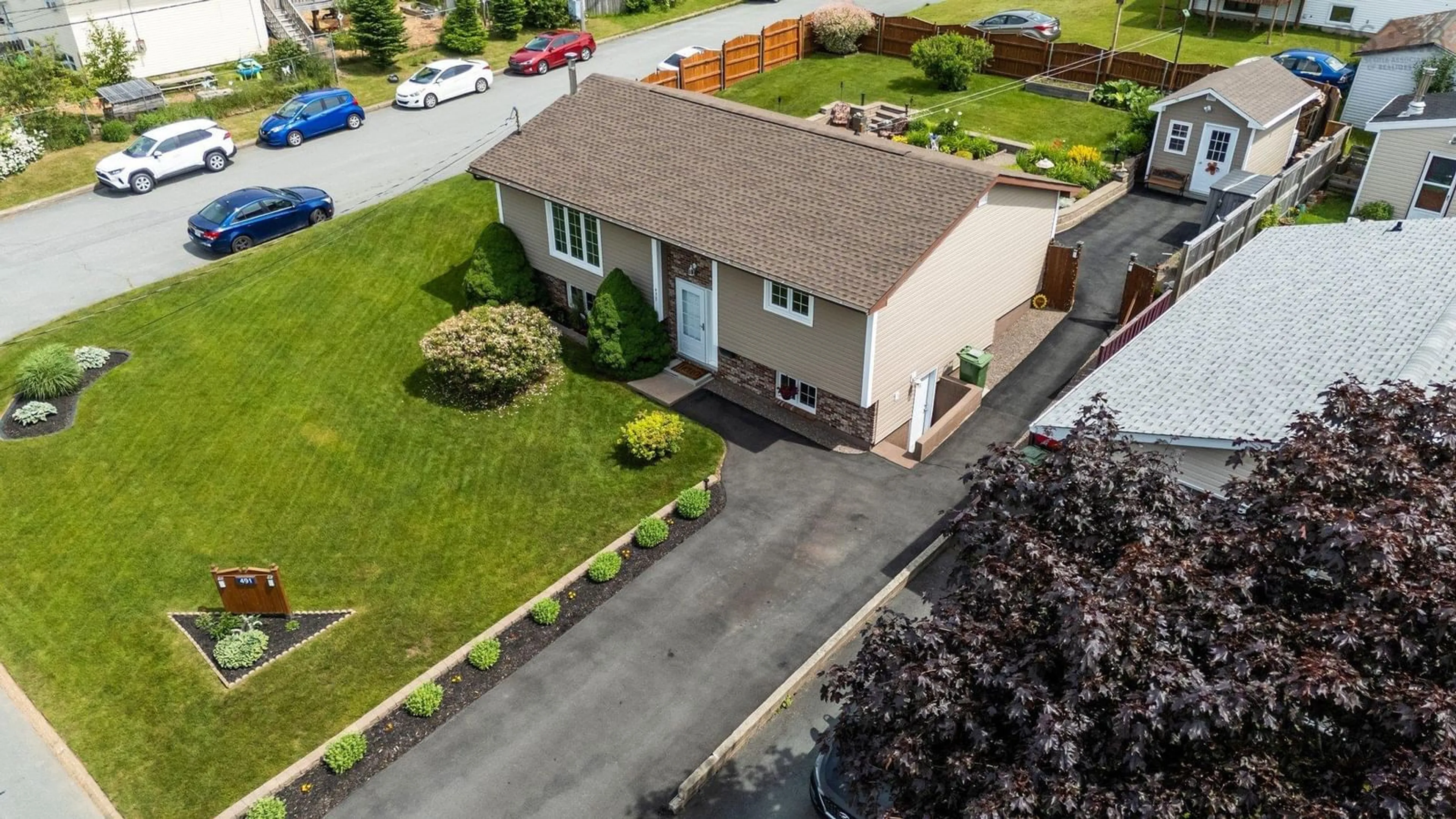 A pic from outside/outdoor area/front of a property/back of a property/a pic from drone, street for 491 Arklow Dr, Dartmouth Nova Scotia B2W 4Z5