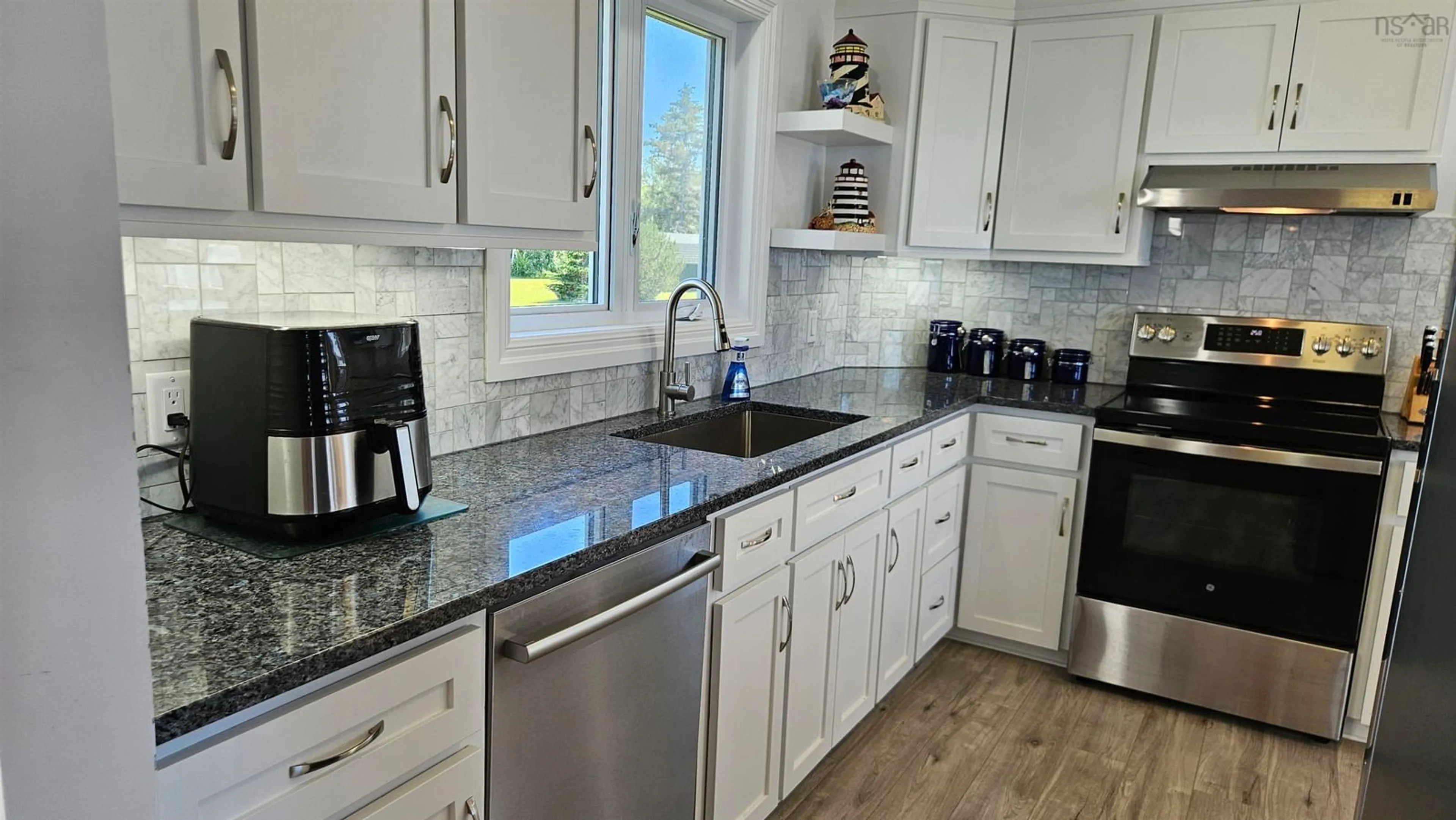 Open concept kitchen, ceramic/tile floor for 2517 Shore Rd, Lower Barneys River Nova Scotia B0K 1G0