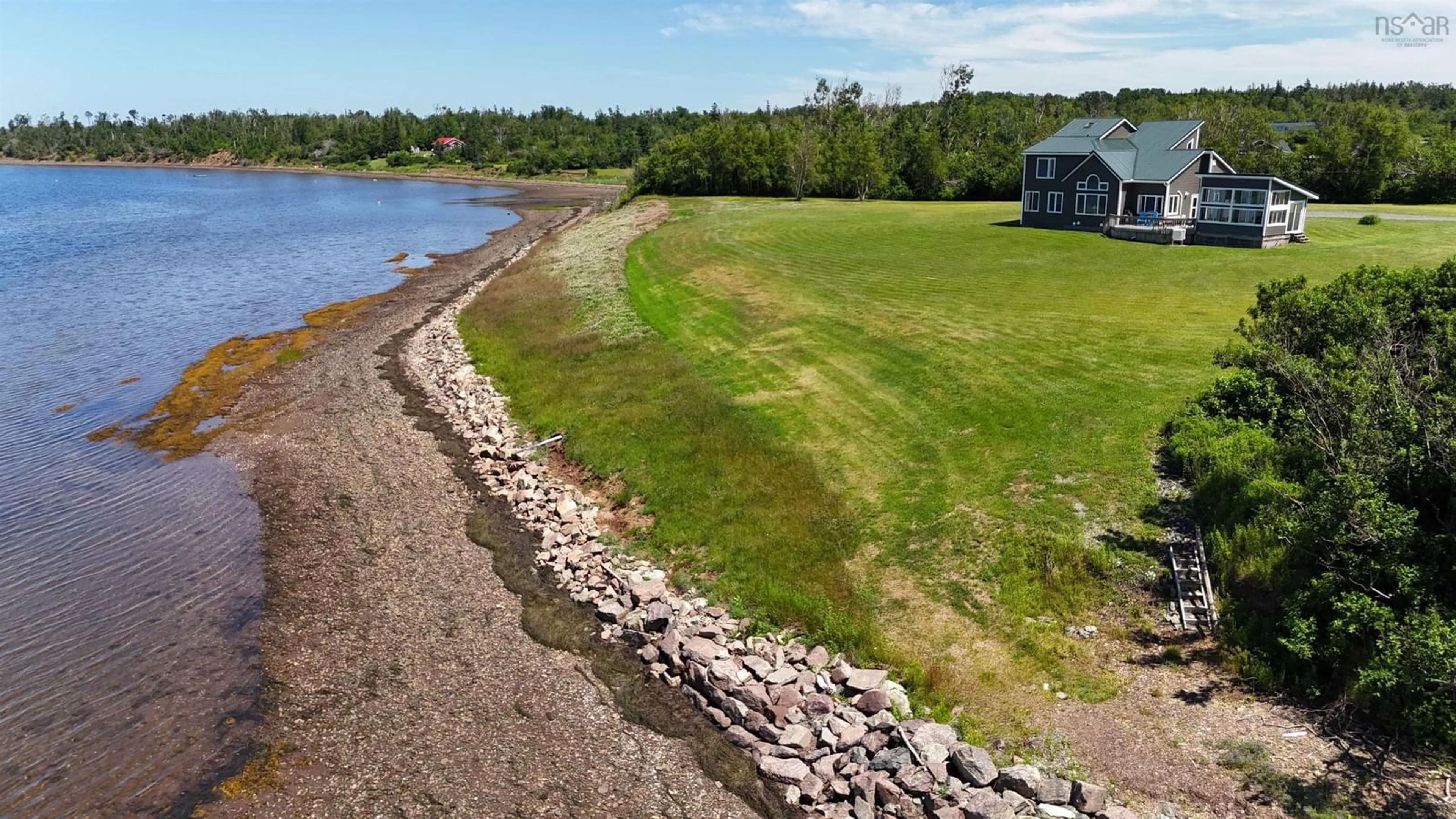 A pic from outside/outdoor area/front of a property/back of a property/a pic from drone, water/lake/river/ocean view for 2517 Shore Rd, Lower Barneys River Nova Scotia B0K 1G0