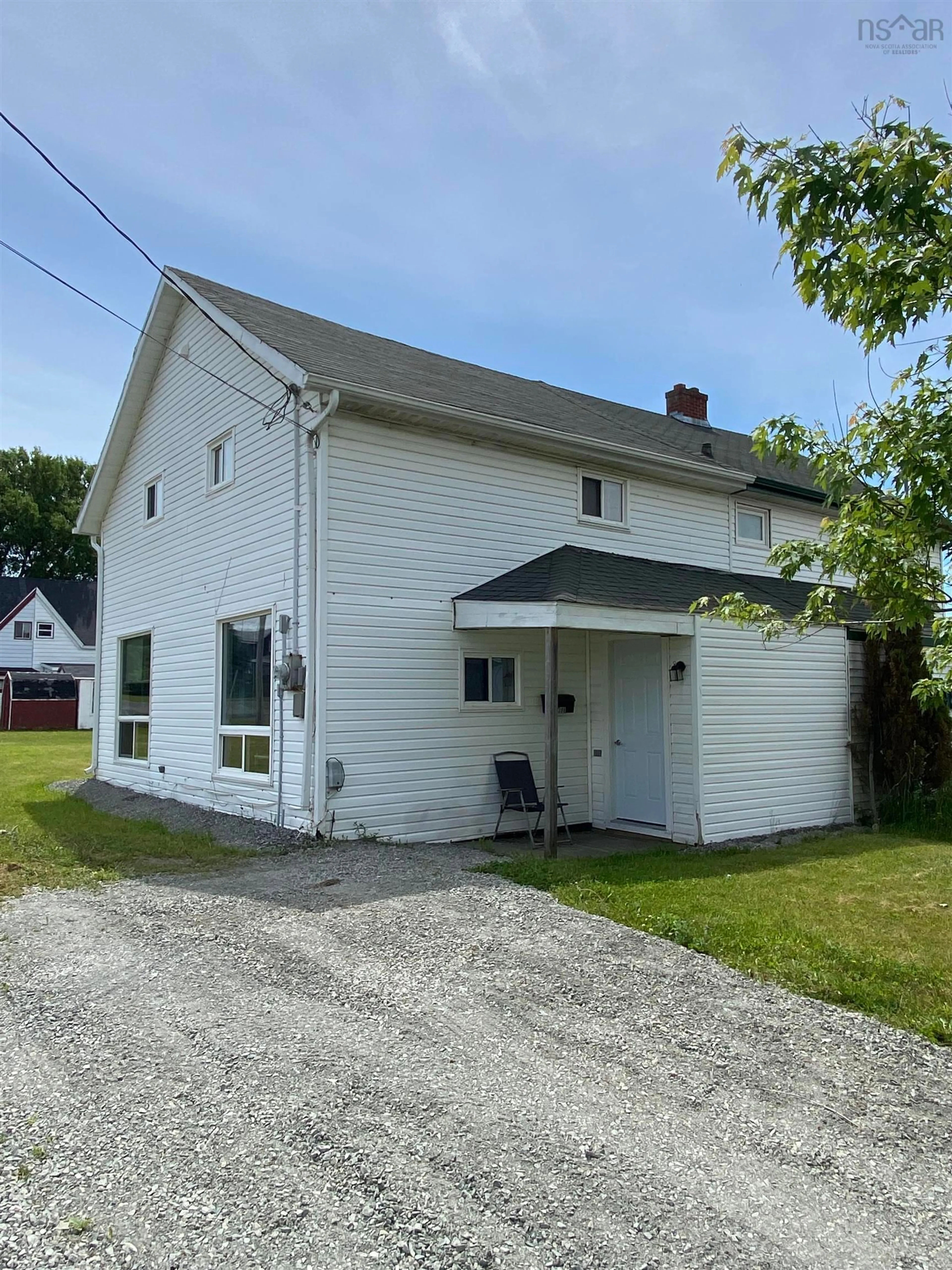 A pic from outside/outdoor area/front of a property/back of a property/a pic from drone, building for 398 Tenth St, New Waterford Nova Scotia B1H 3W7