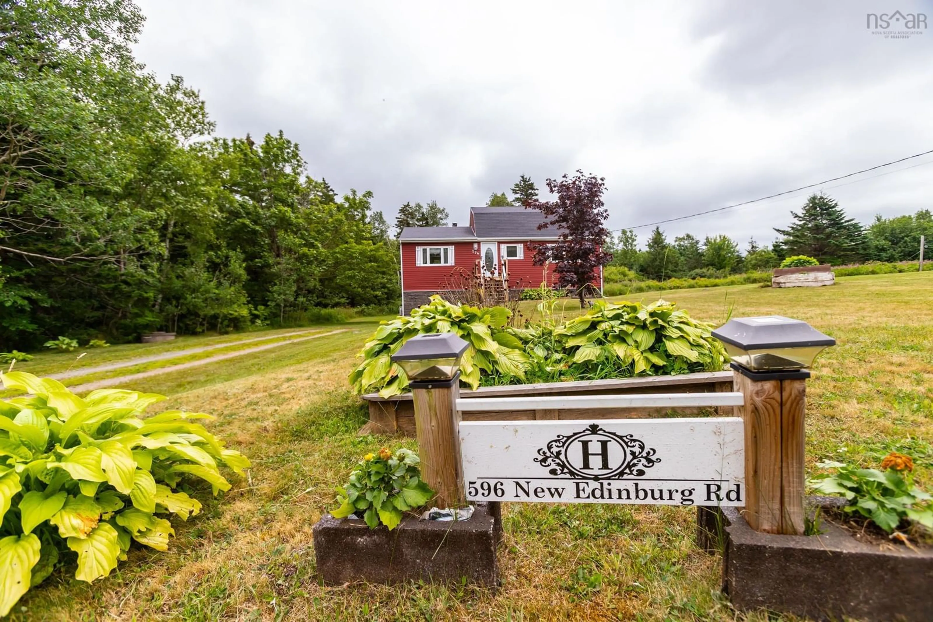 A pic from outside/outdoor area/front of a property/back of a property/a pic from drone, building for 596 New Edinburgh Road, New Edinburgh Nova Scotia B0W 3T0