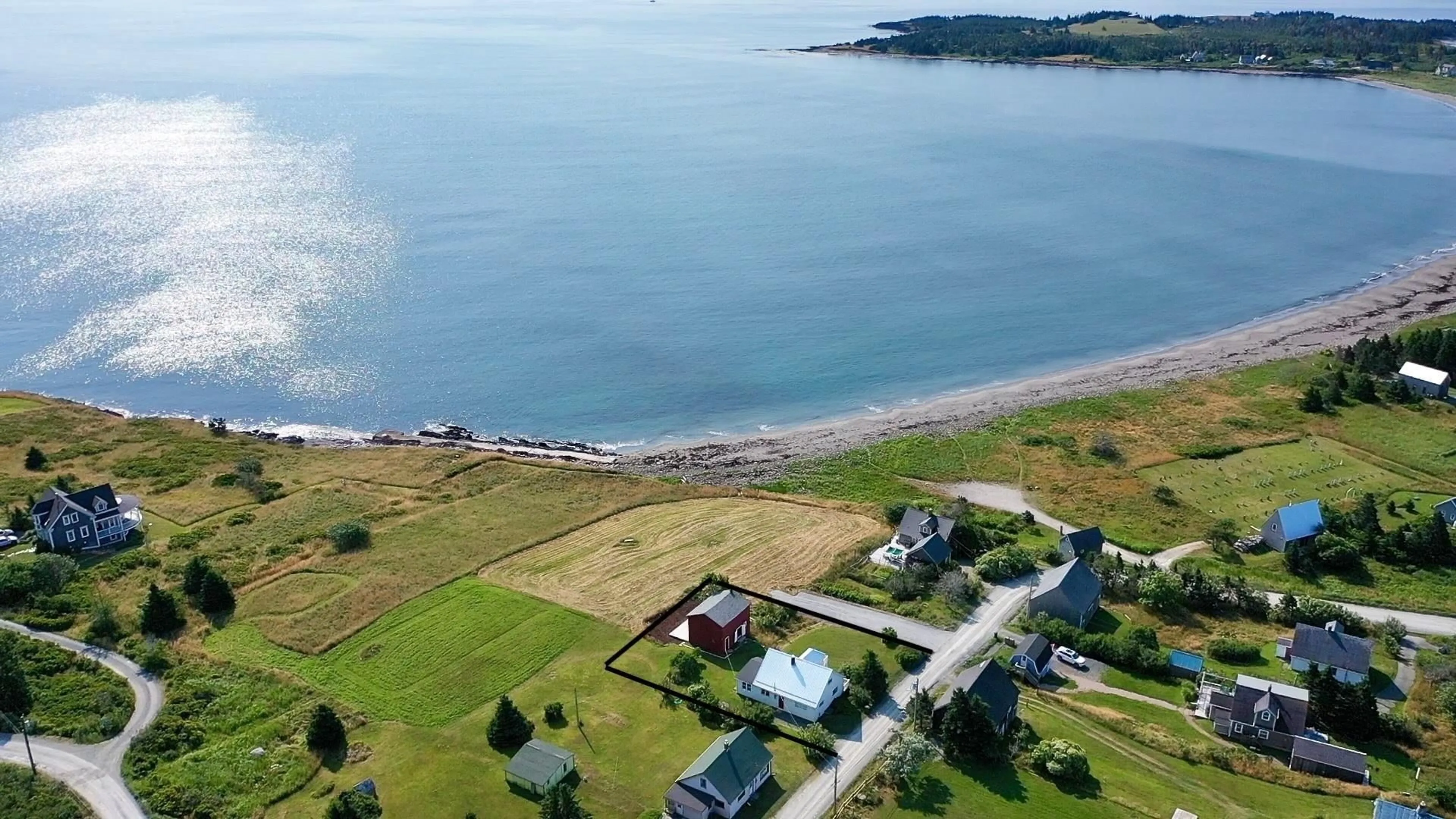A pic from outside/outdoor area/front of a property/back of a property/a pic from drone, water/lake/river/ocean view for 85 Mosher Rd, Kingsburg Nova Scotia B0J 2X0