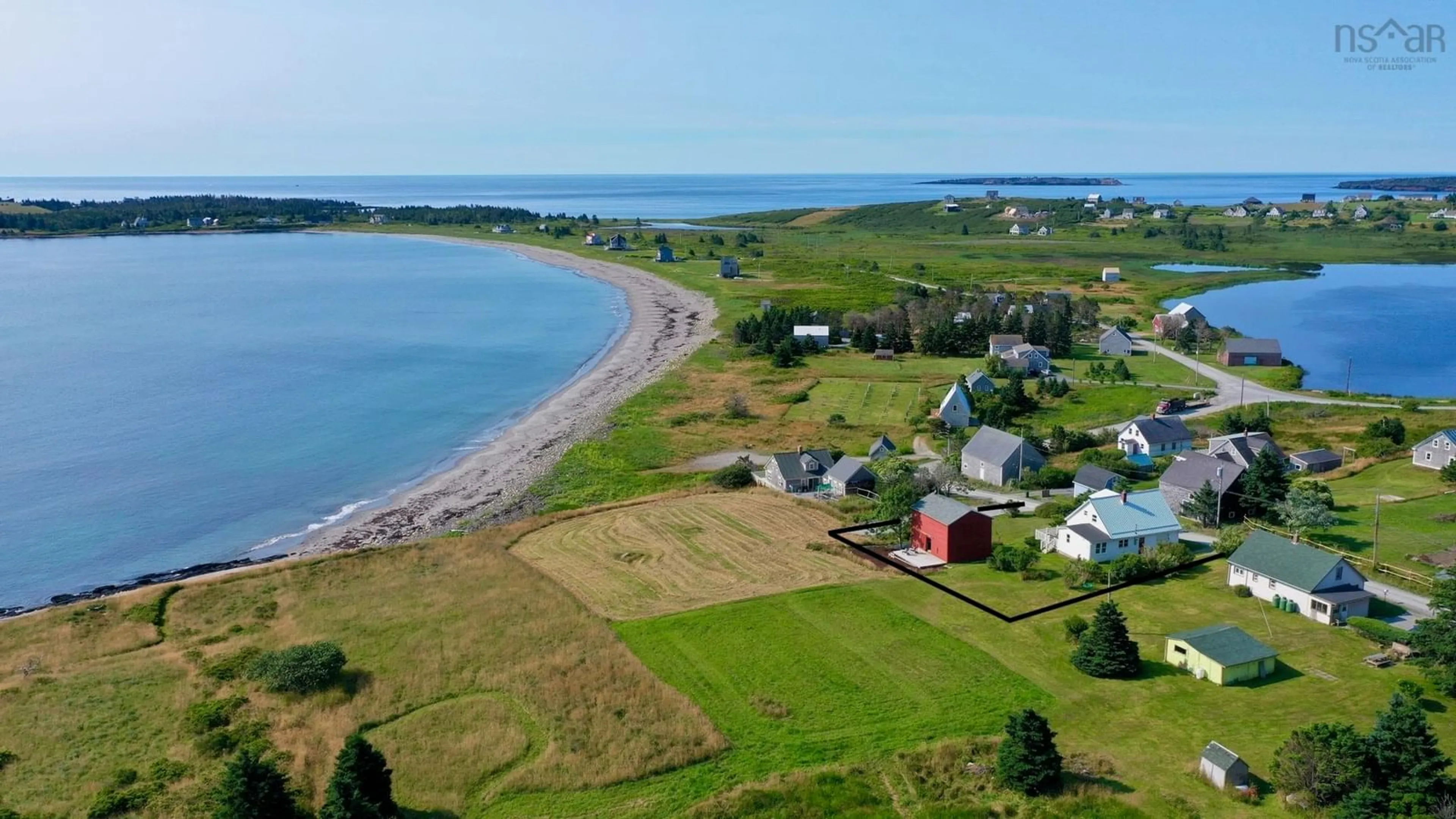 A pic from outside/outdoor area/front of a property/back of a property/a pic from drone, water/lake/river/ocean view for 85 Mosher Rd, Kingsburg Nova Scotia B0J 2X0