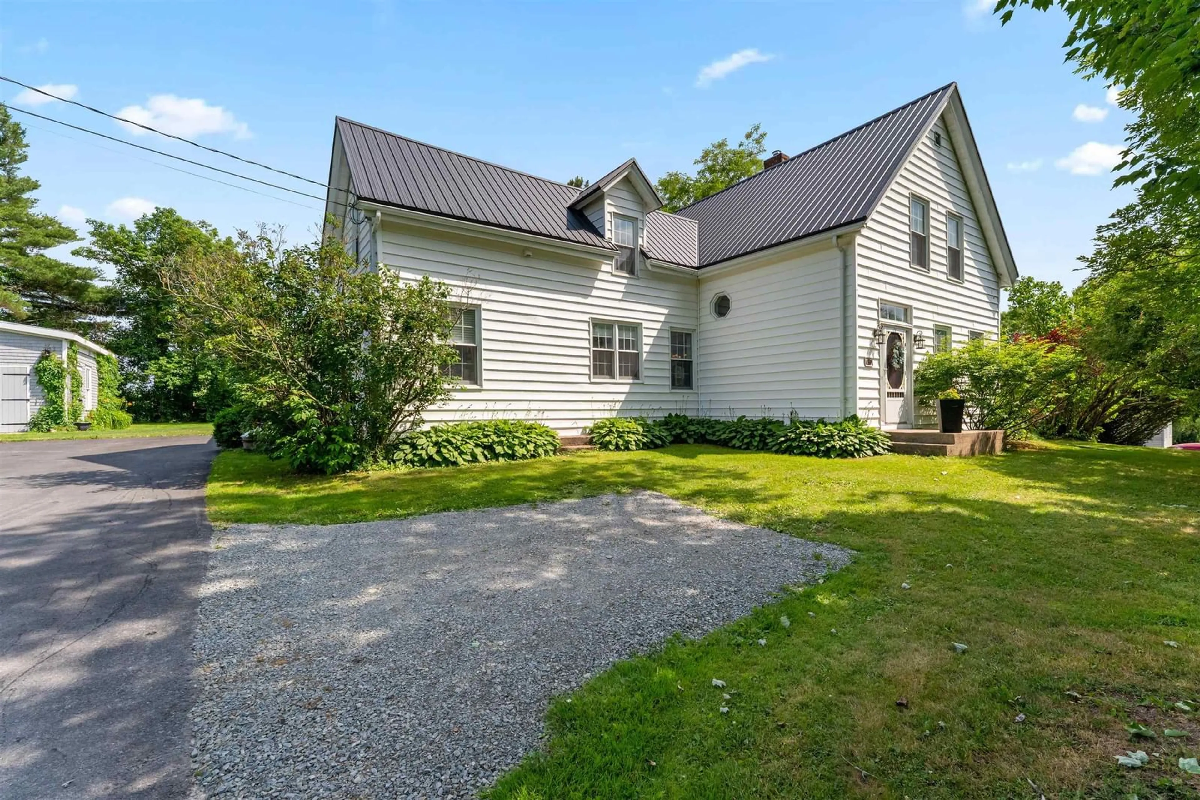 A pic from outside/outdoor area/front of a property/back of a property/a pic from drone, street for 2141 Highway 2, Milford Nova Scotia B0N 1Y0