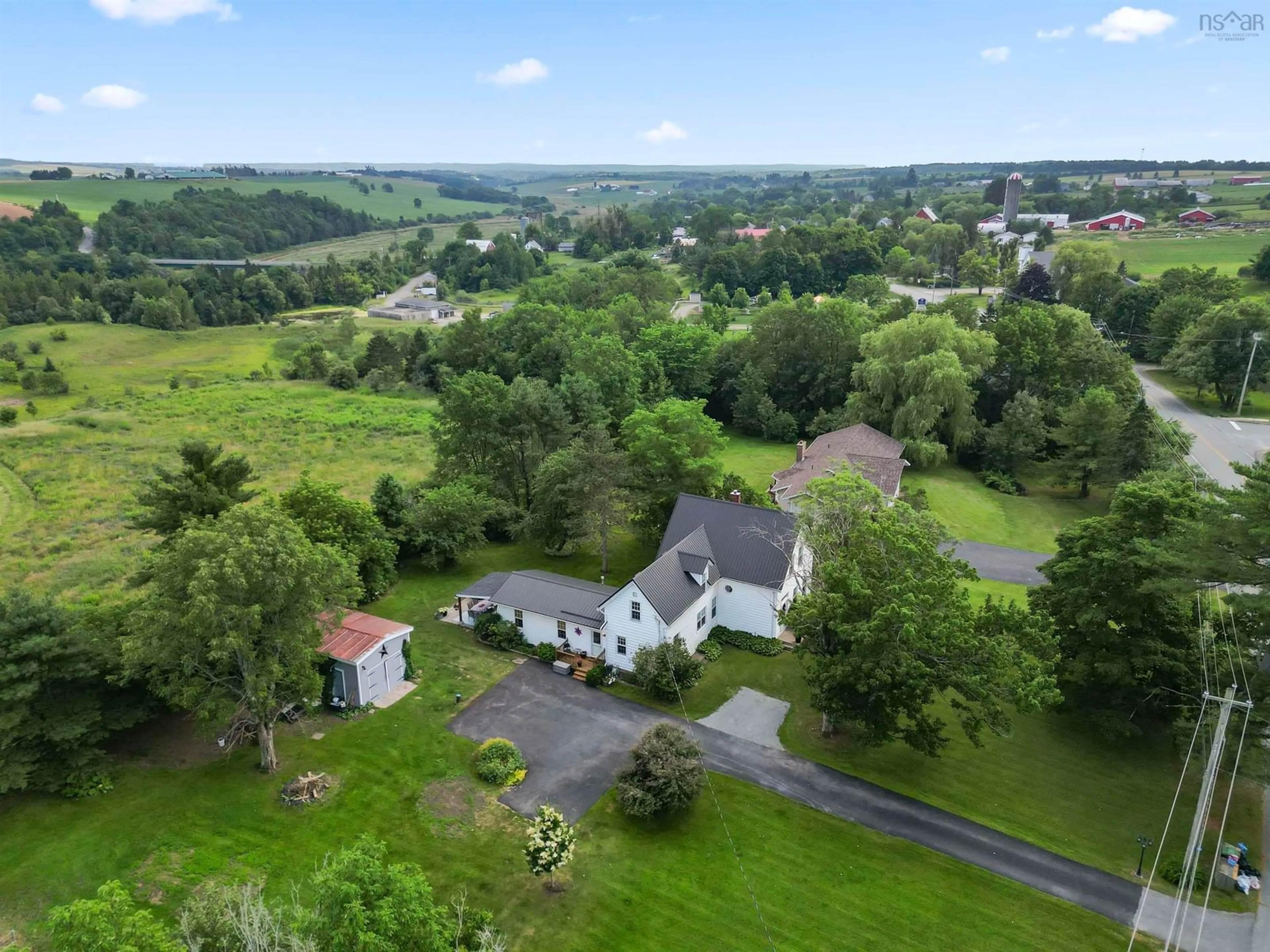A pic from outside/outdoor area/front of a property/back of a property/a pic from drone, mountain view for 2141 Highway 2, Milford Nova Scotia B0N 1Y0