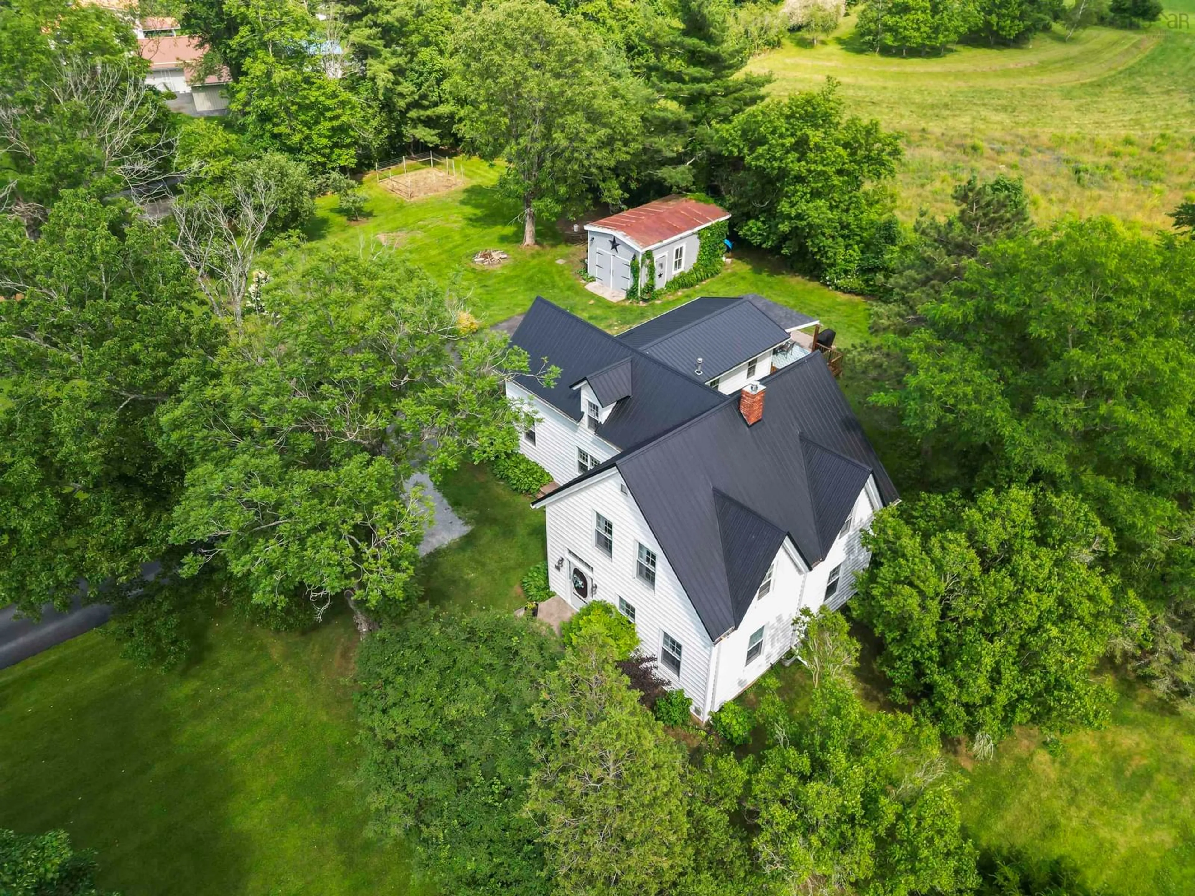 A pic from outside/outdoor area/front of a property/back of a property/a pic from drone, building for 2141 Highway 2, Milford Nova Scotia B0N 1Y0