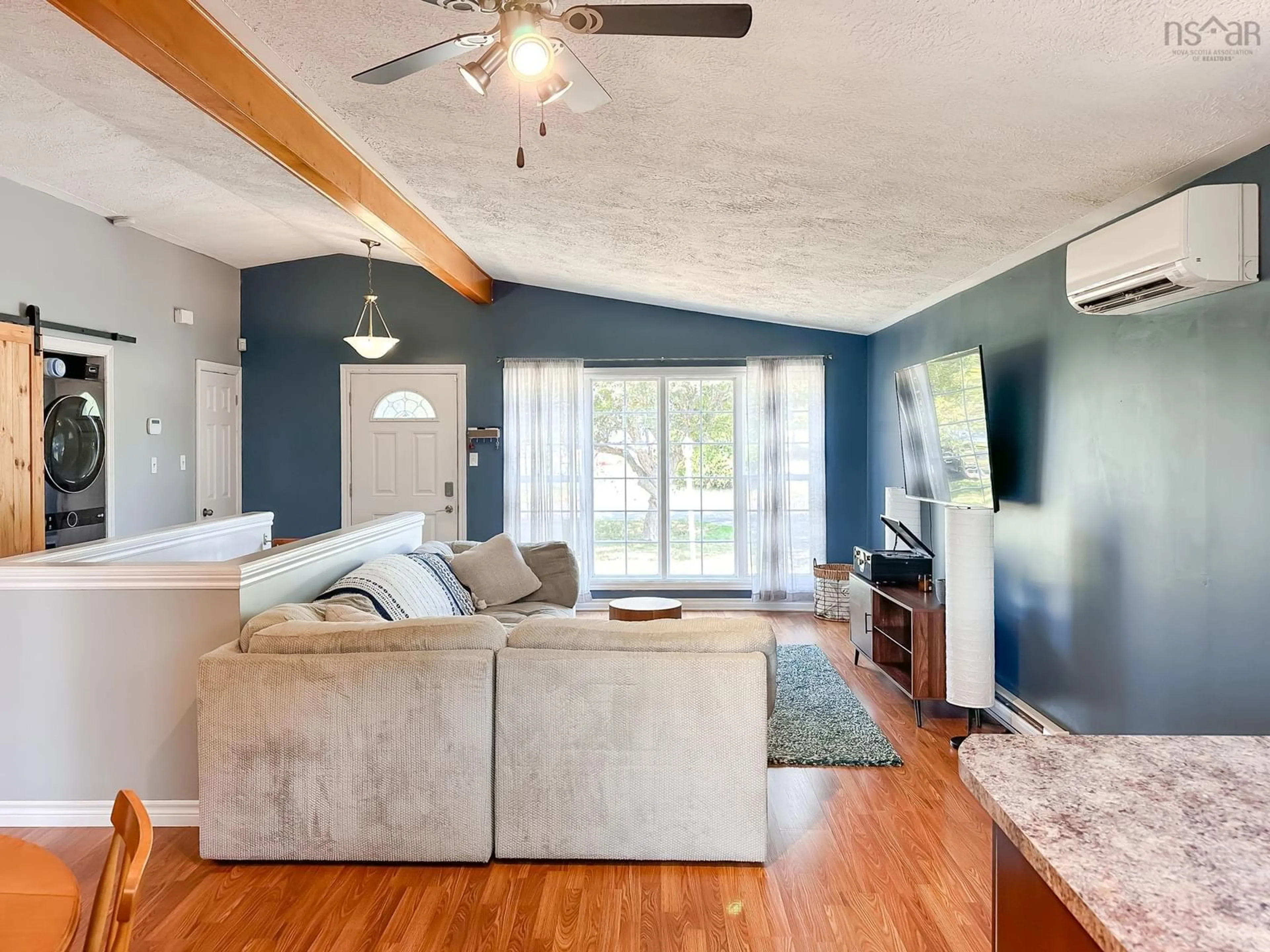 Living room with furniture, wood/laminate floor for 1131 Garden Crt, New Minas Nova Scotia B4N 0G2