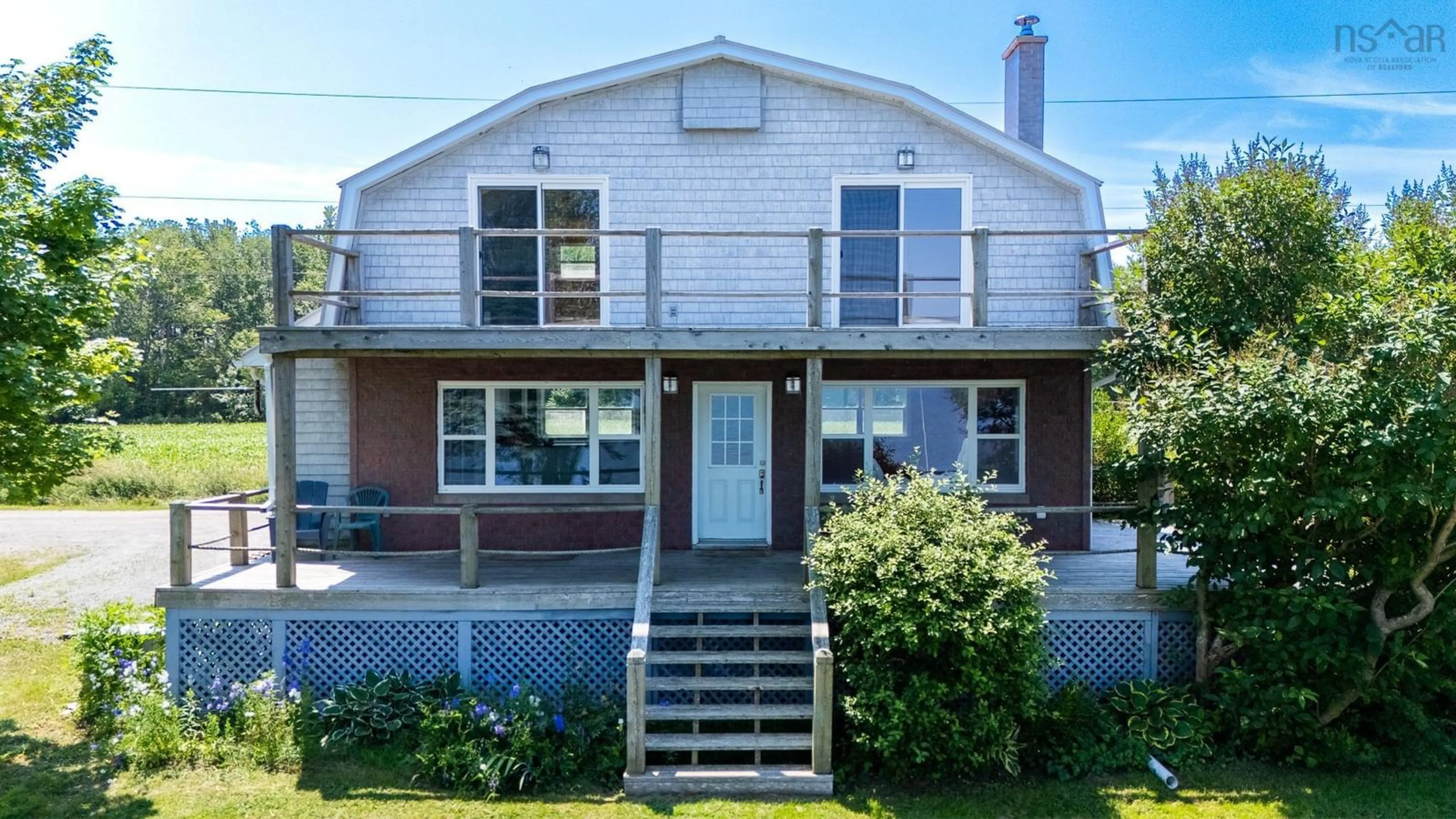Home with vinyl exterior material, street for 102 Pheasant Rd, North Grand Pre Nova Scotia B0P 1M0