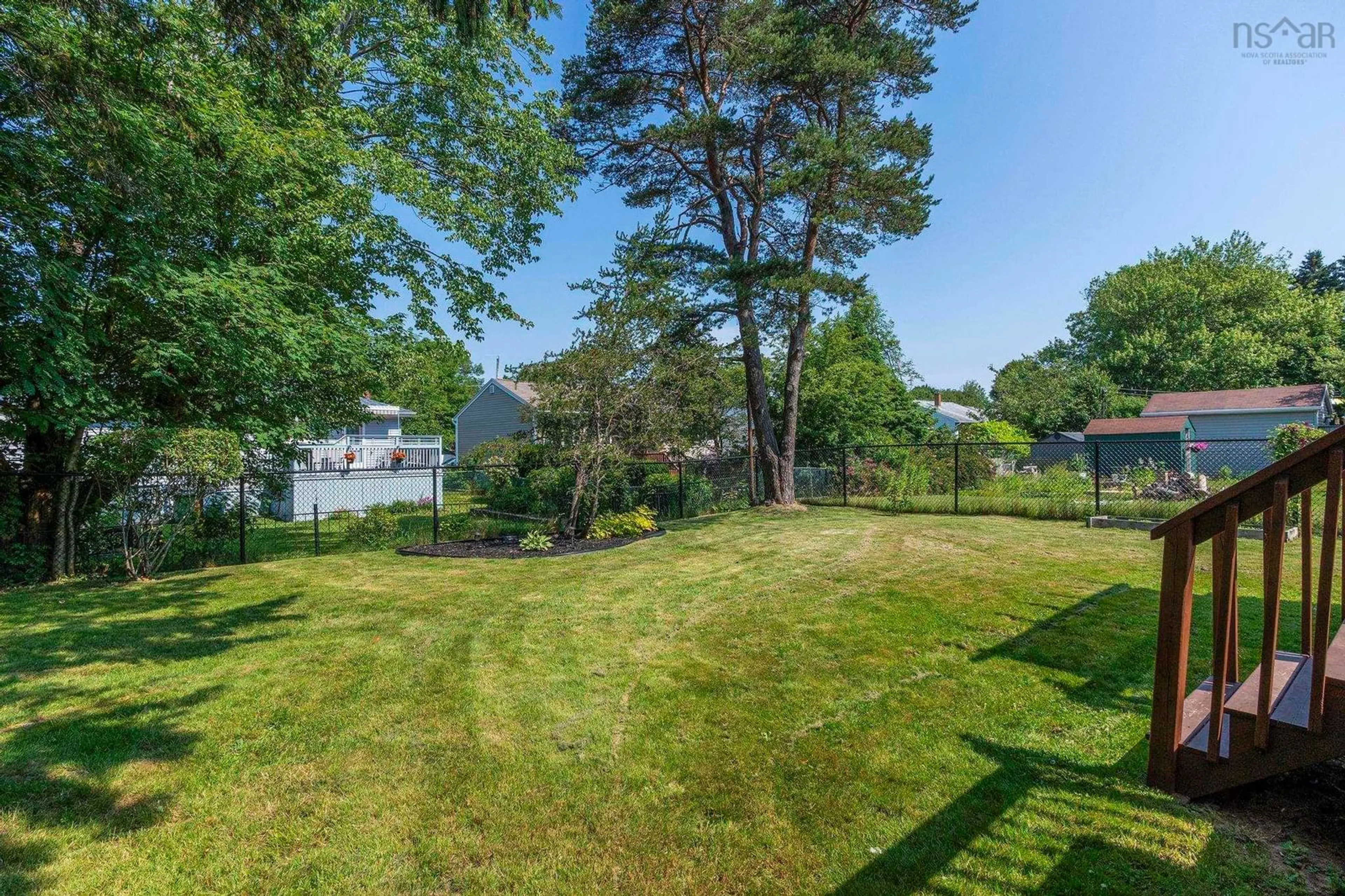 A pic from outside/outdoor area/front of a property/back of a property/a pic from drone, water/lake/river/ocean view for 19 Woodland Ave, Dartmouth Nova Scotia B3A 3J6