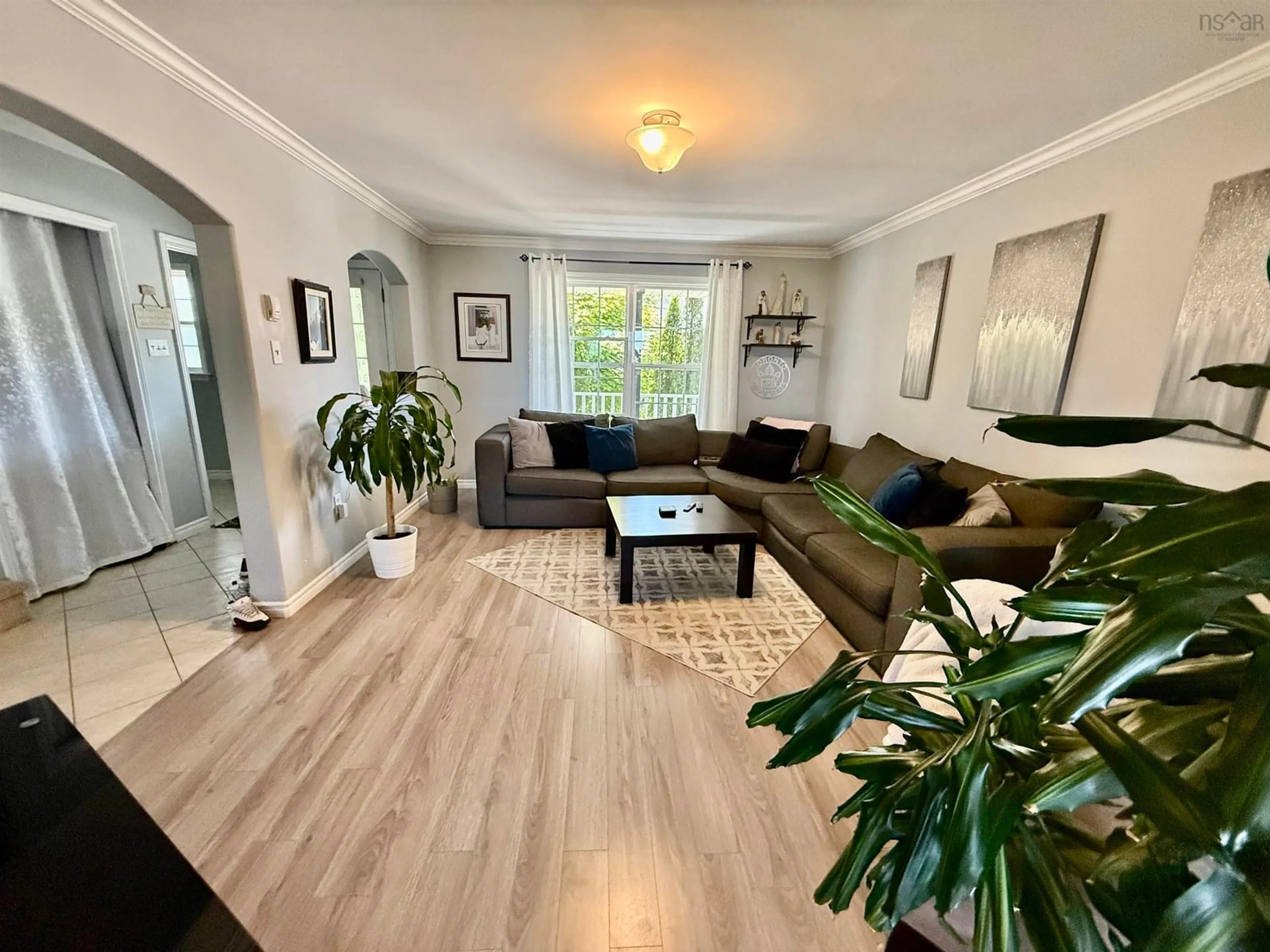 Living room with furniture, wood/laminate floor for 153 Beech Tree Run, Beechville Nova Scotia B3T 2G1