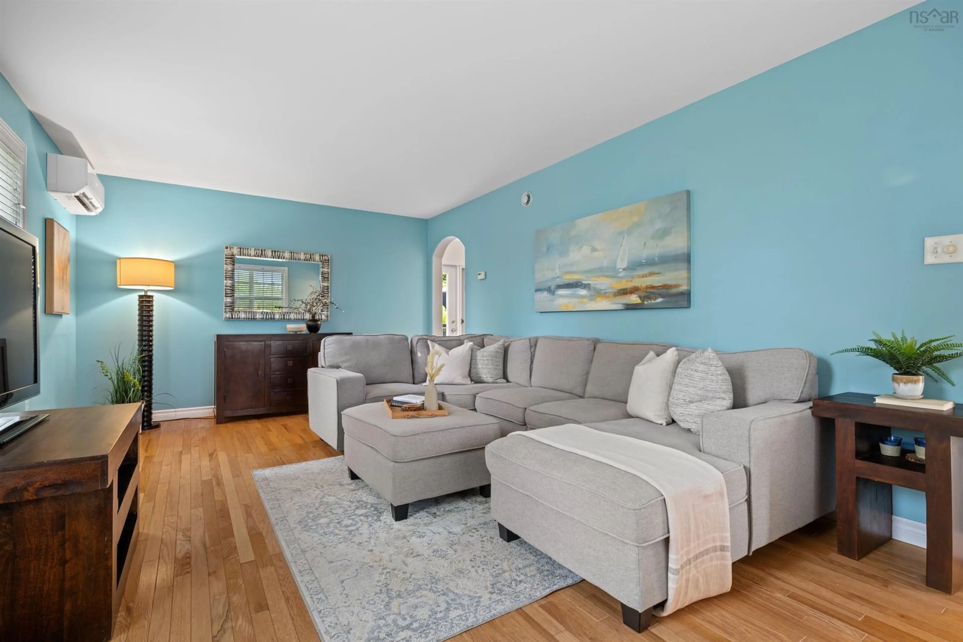 Living room with furniture, wood/laminate floor for 375 St. George Blvd, Hammonds Plains Nova Scotia B4B 1T2