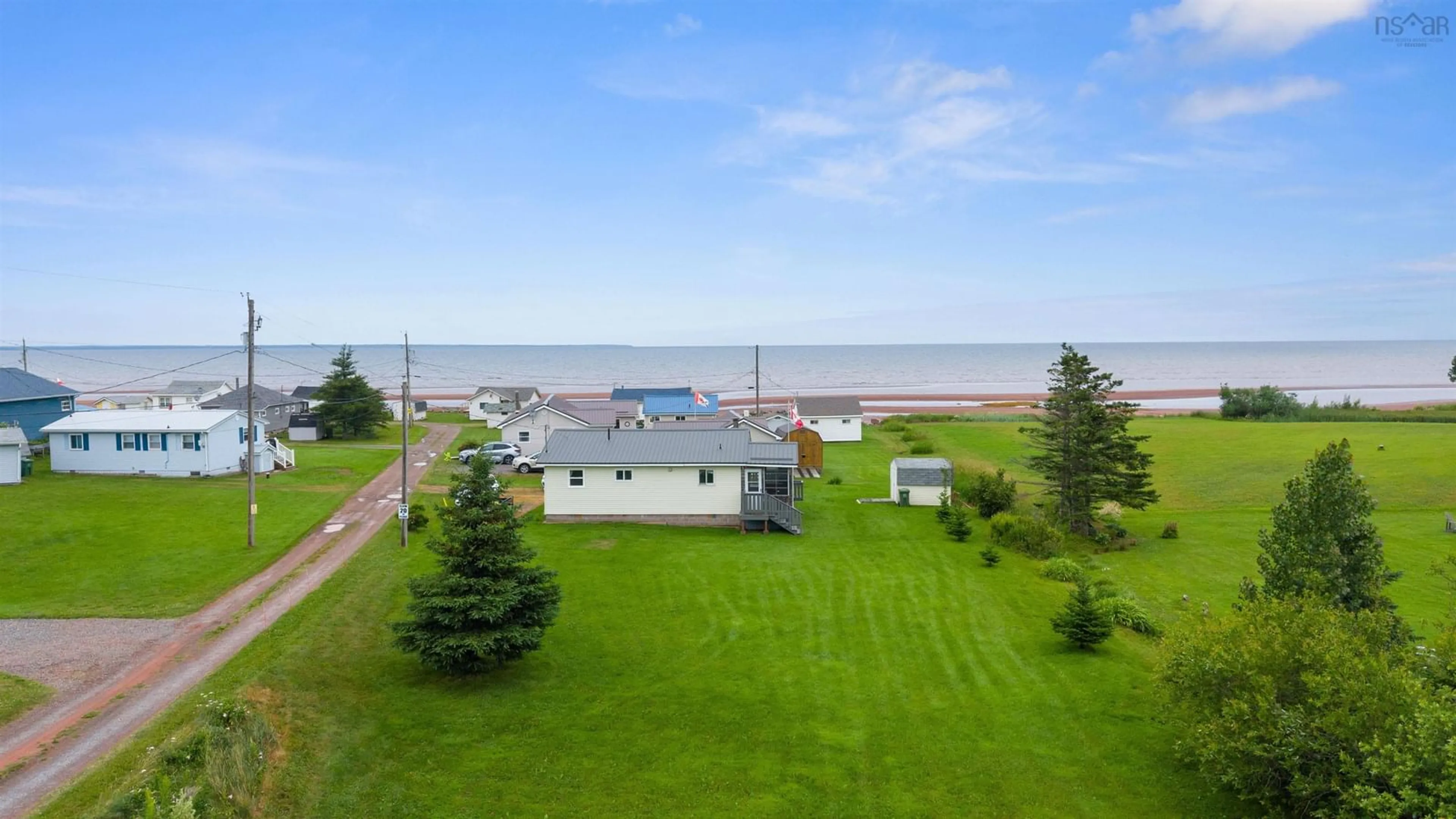 A pic from outside/outdoor area/front of a property/back of a property/a pic from drone, water/lake/river/ocean view for 10 Sunrise Lane, Amherst Shore Nova Scotia B4H 3Y2